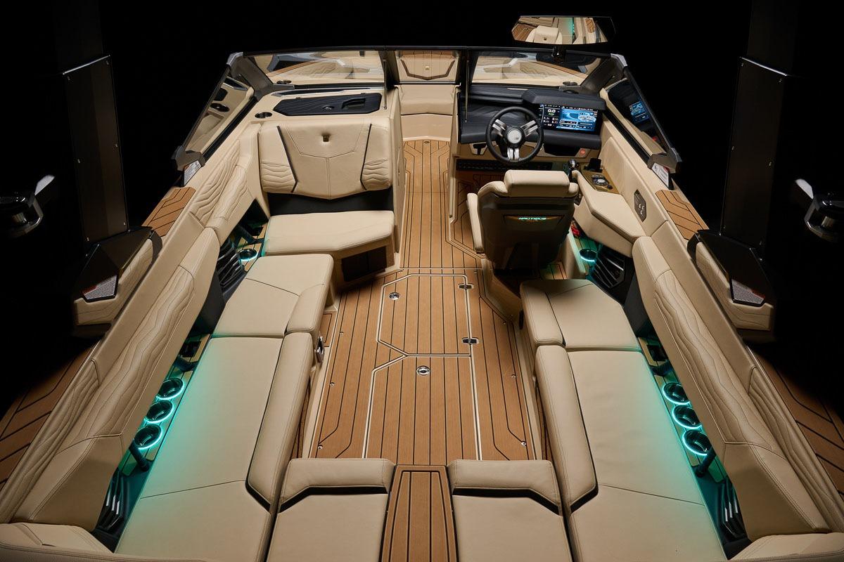 Manufacturer Provided Image: Luxurious interior of 2026 Nautique Super Air Nautique G23 with elegant seating and ambient lighting.
