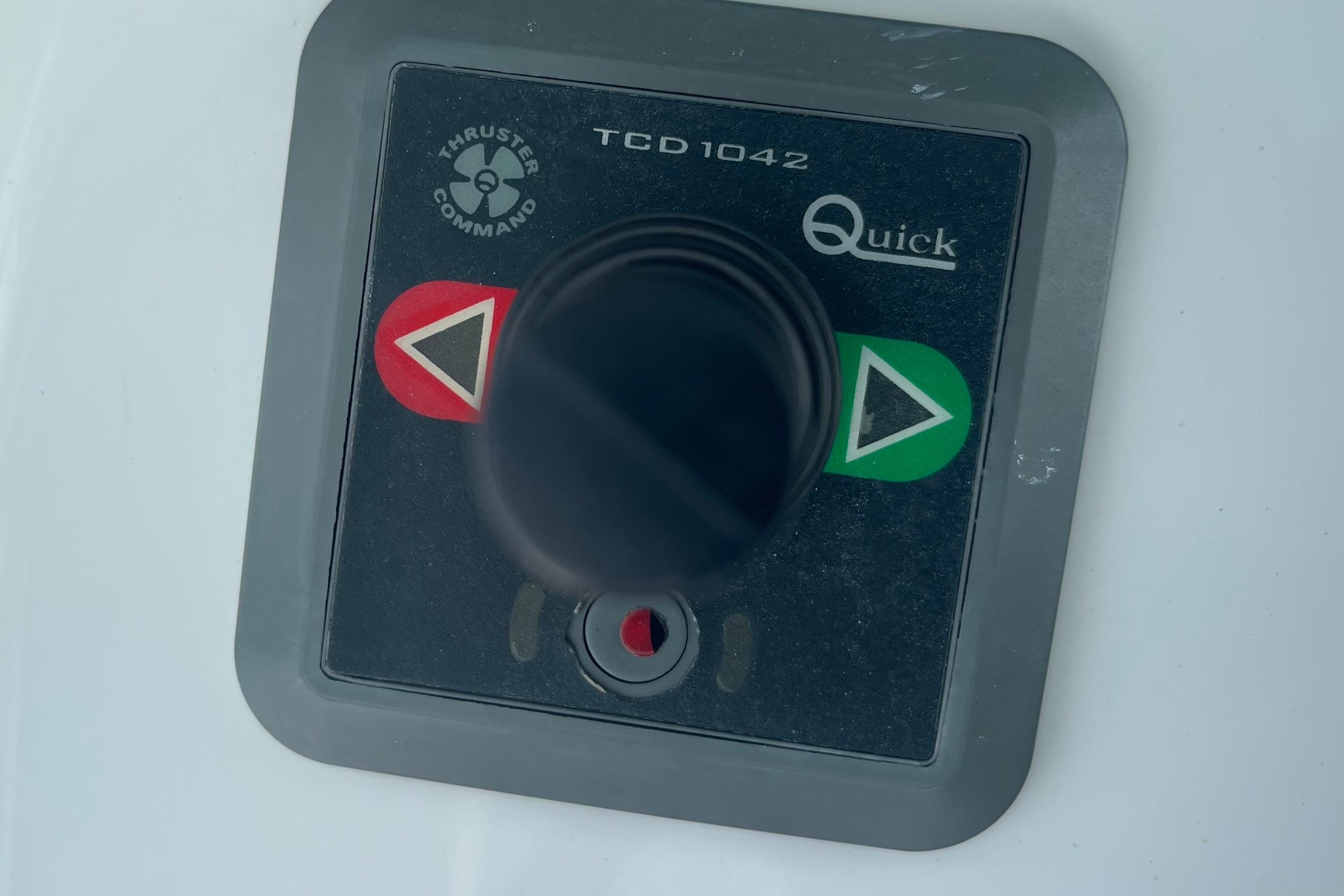Control panel of a 2020 Jupiter 38 boat with thruster command joystick.