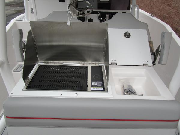 2025 Solara S-250 CW boat interior with grill and sink setup.