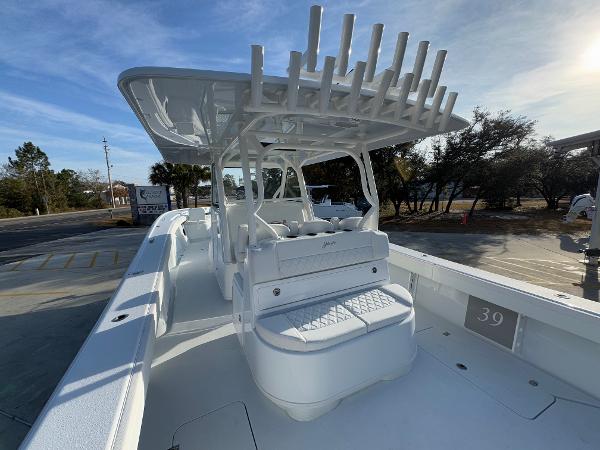 2025 Yellowfin 39 Offshore boat with spacious deck and seating, parked outdoors.