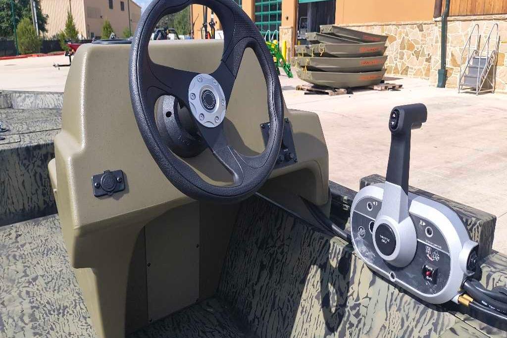 2026 Tracker Grizzly 1648 SC boat steering console and control panel.