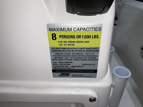 2026 Robalo 226 Cayman capacity label, maximum 8 persons or 1200 lbs, 250 HP motor.