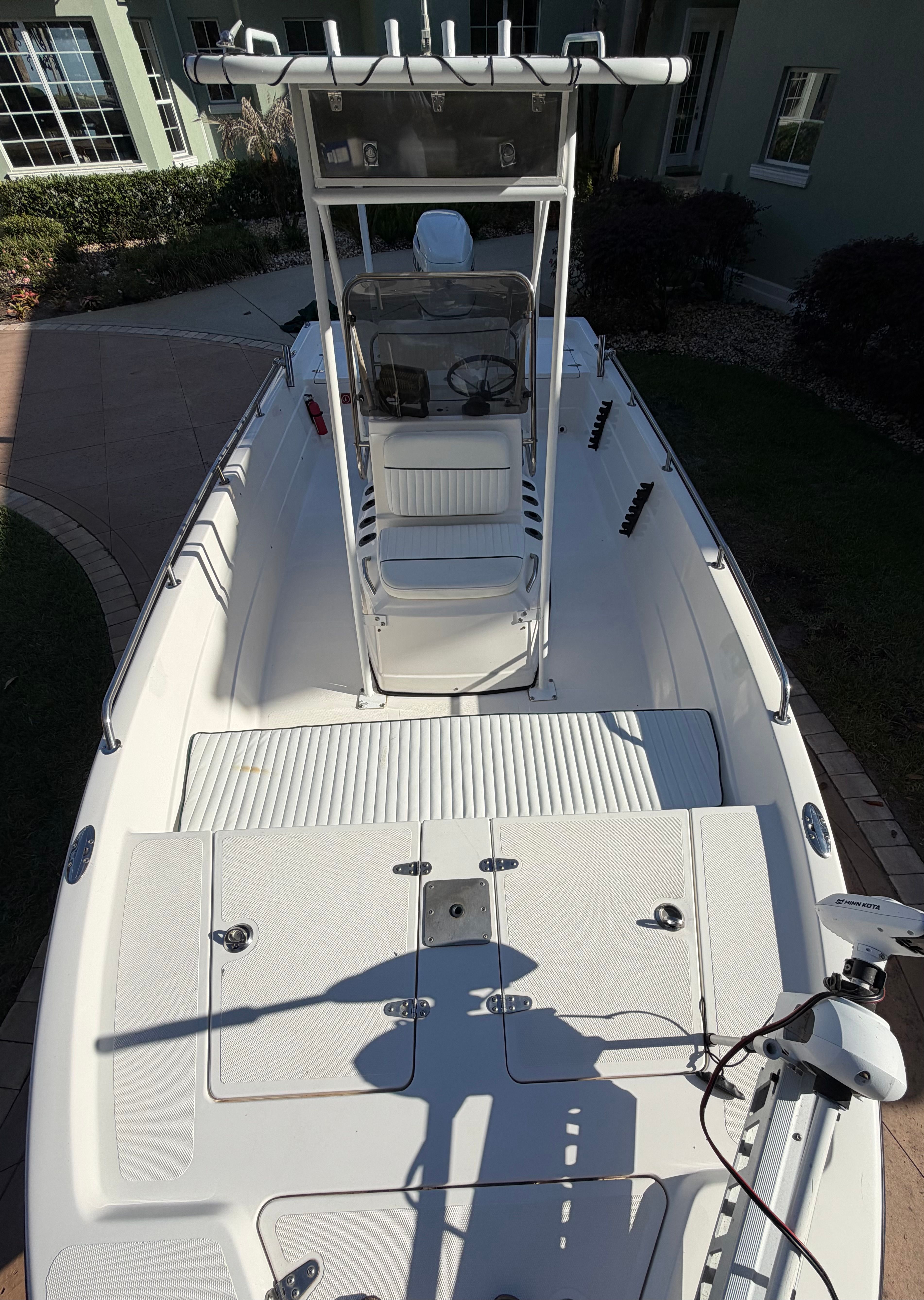 1999 Skeeter ZX2200 boat with T-top and helm console.