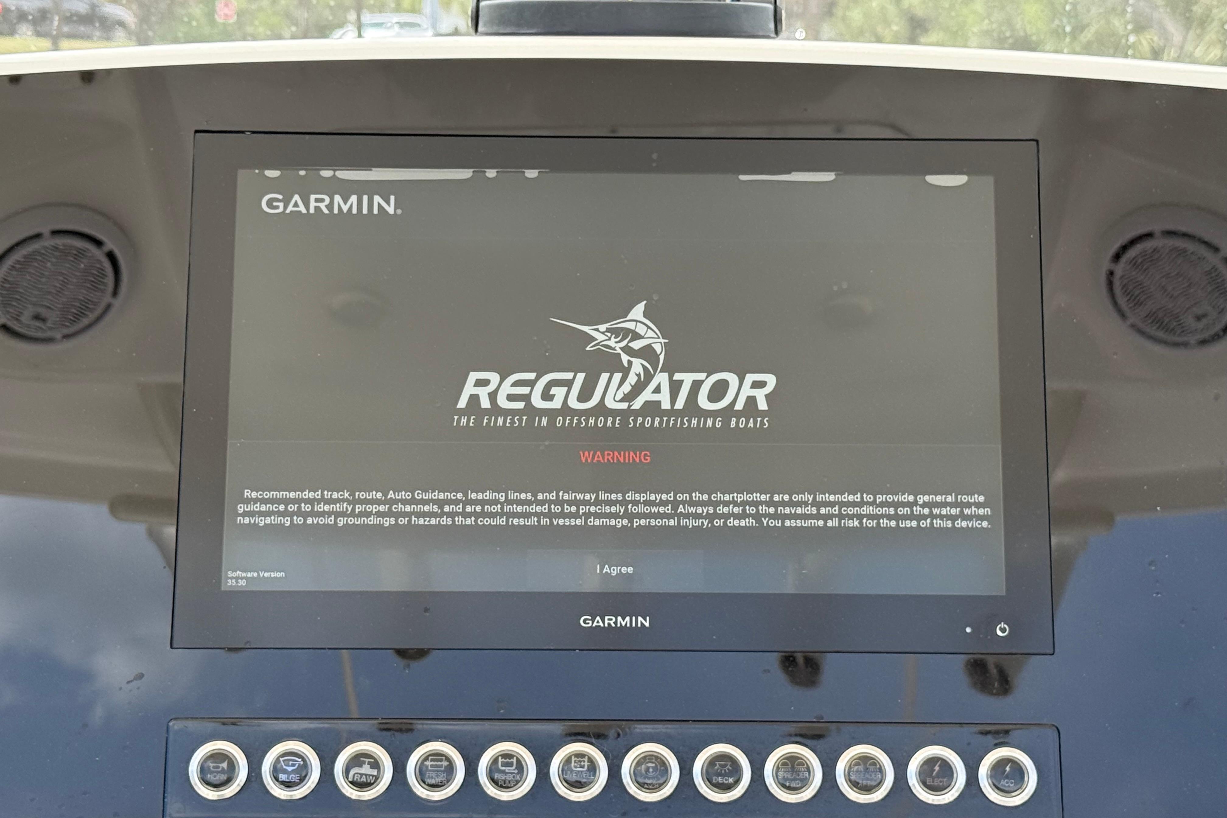 Garmin display on 2019 Regulator 26XO boat, featuring navigation warning screen.