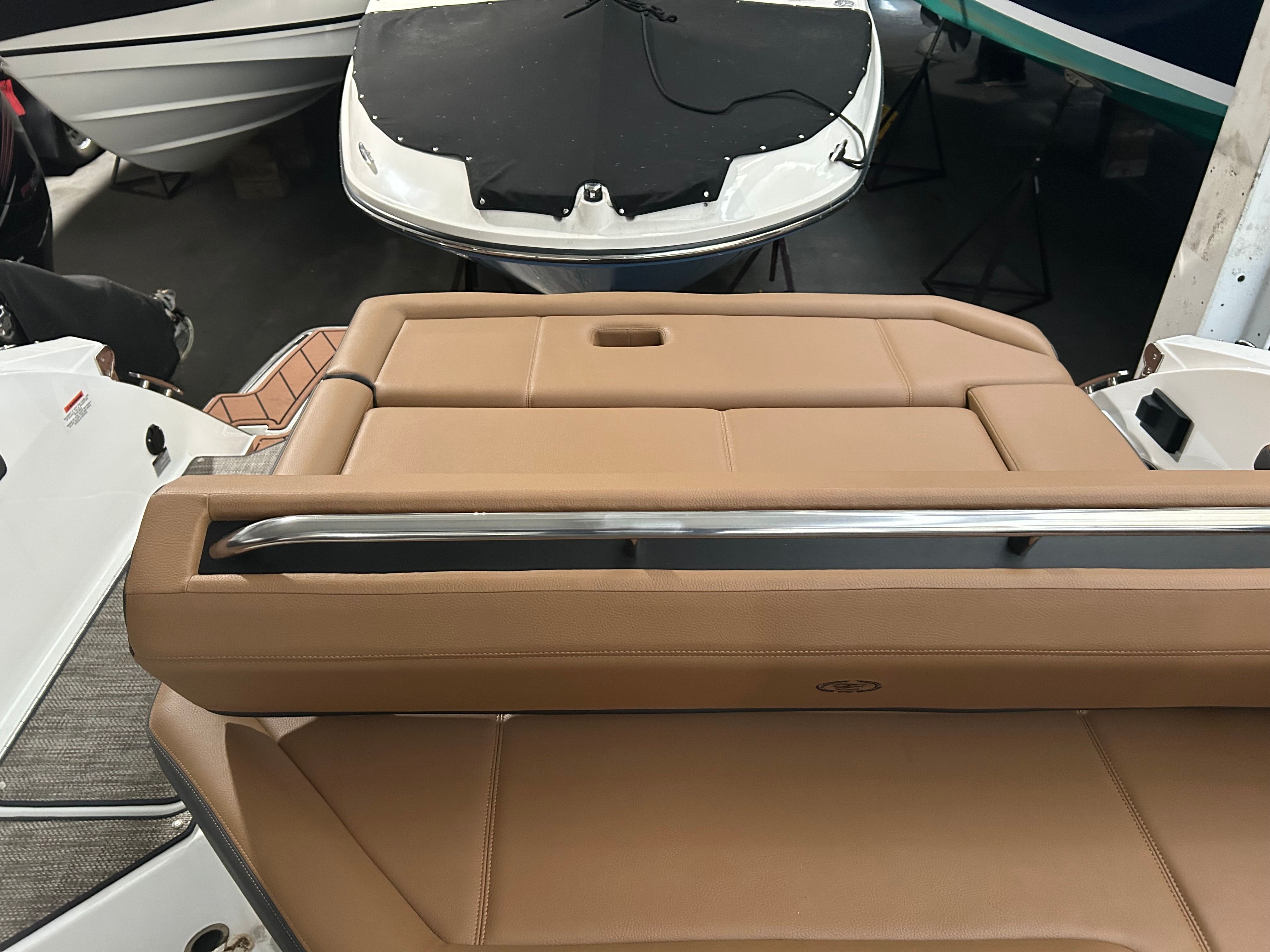 2024 Cobalt R6 boat with brown leather seating.