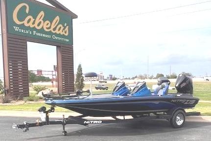 2026 Nitro Z19 XL boat in front of Cabela's store.
