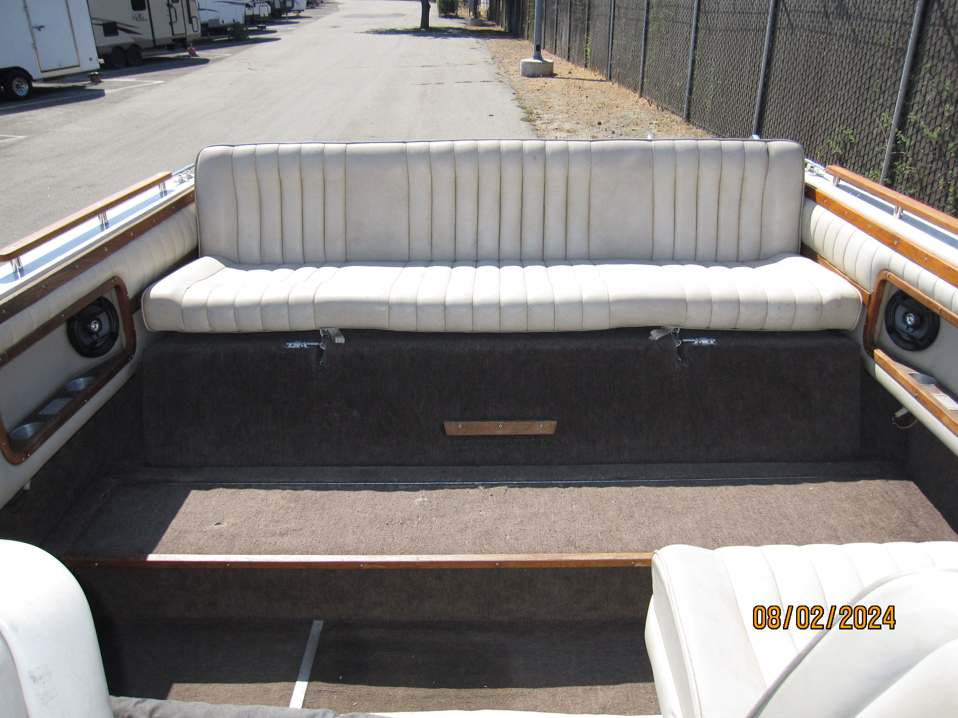 Interior of a 1990 Cobalt Bowrider Classic boat with white seating.