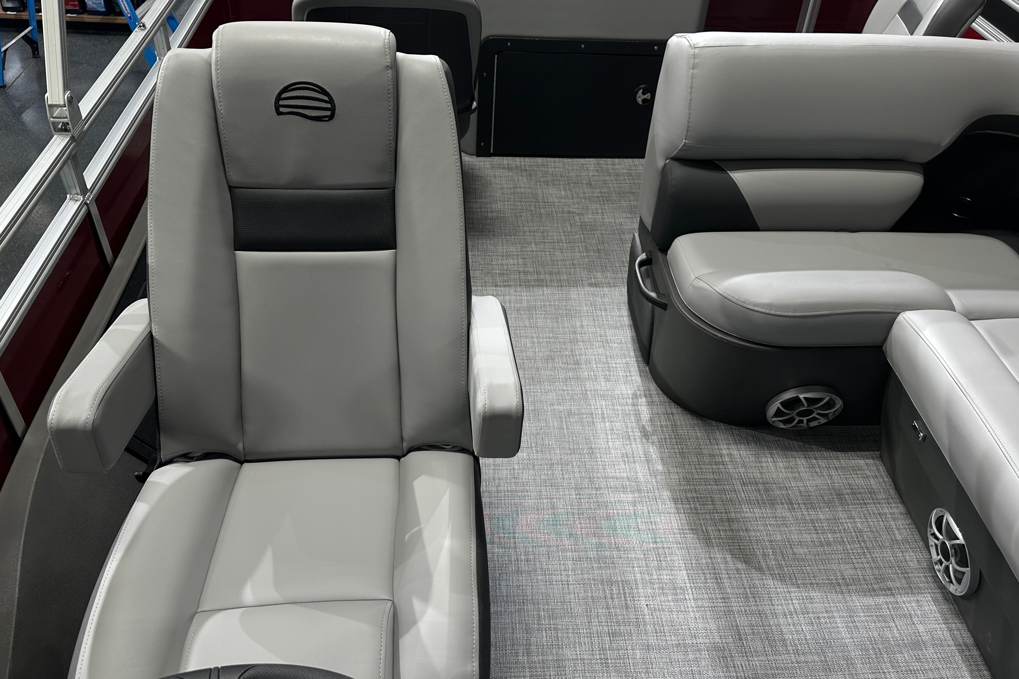2026 Sun Tracker SportFish 22 DLX interior with gray seating and modern design.