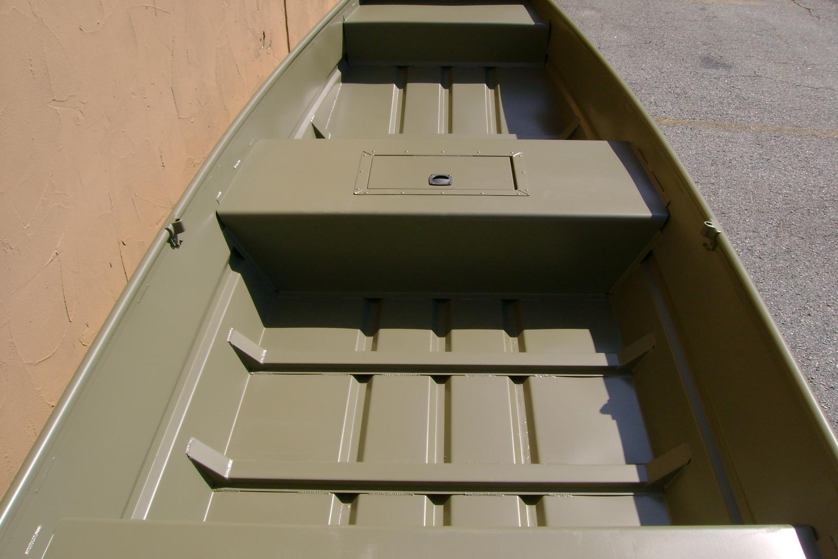2026 Tracker Grizzly 15 Jon boat interior, featuring durable seating and storage compartments.