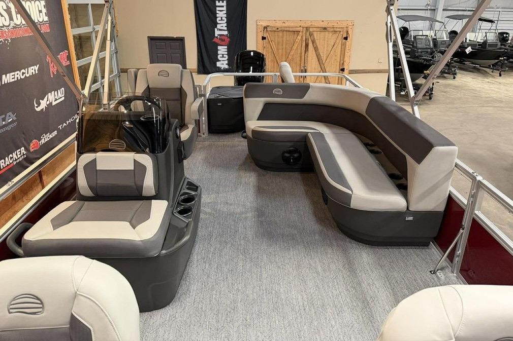 2026 Sun Tracker Bass Buggy 18 DLX pontoon boat interior with spacious seating and modern design.