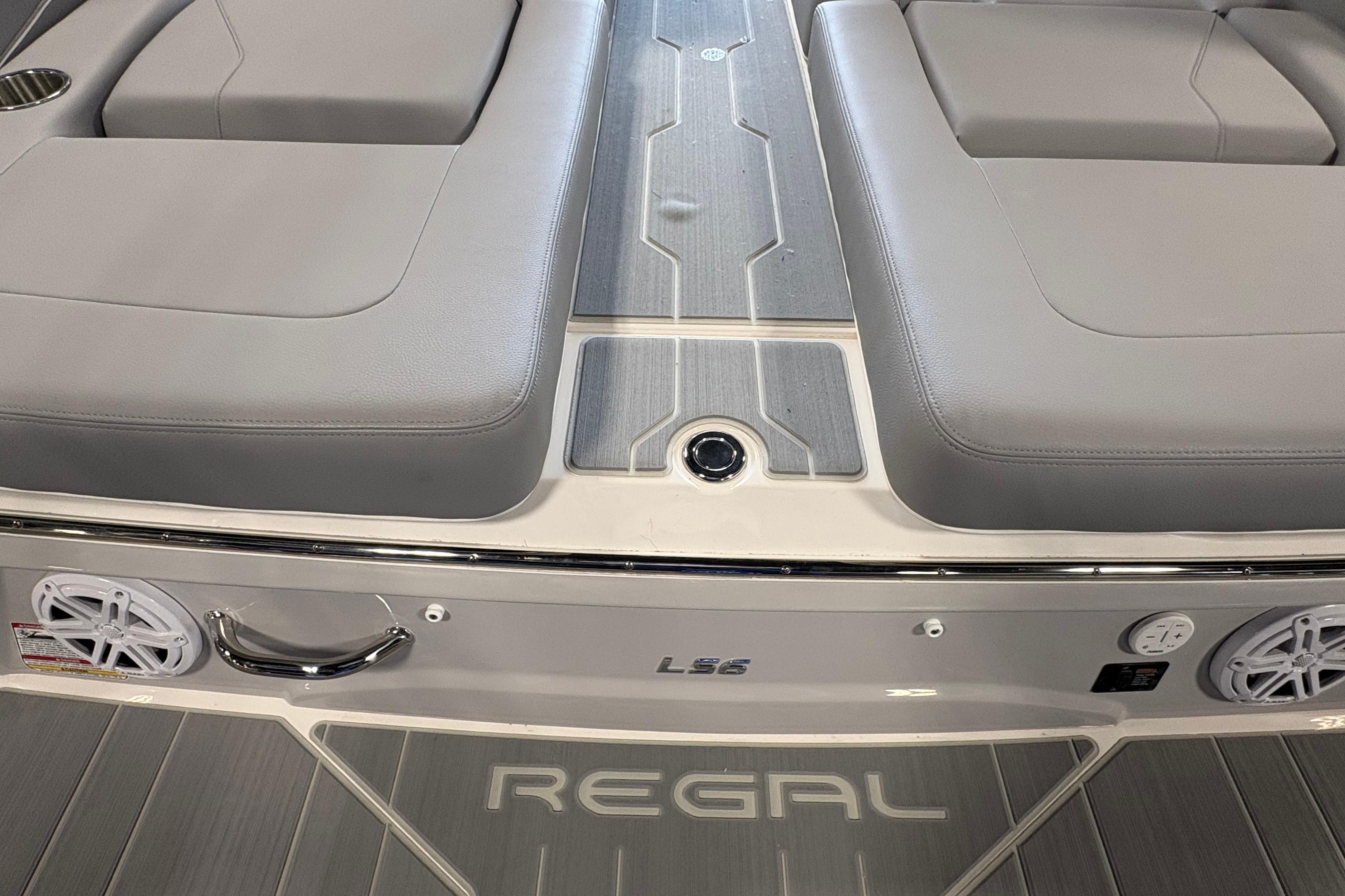 2027 Regal LS6 boat interior with gray seating and sleek design elements.