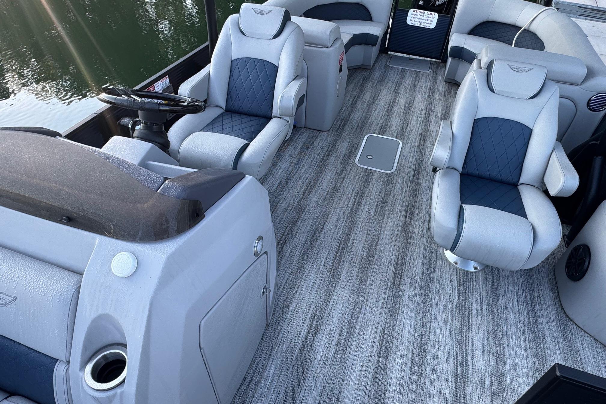 2025 Bennington 26 L Top Deck boat interior with luxurious seating and modern design.