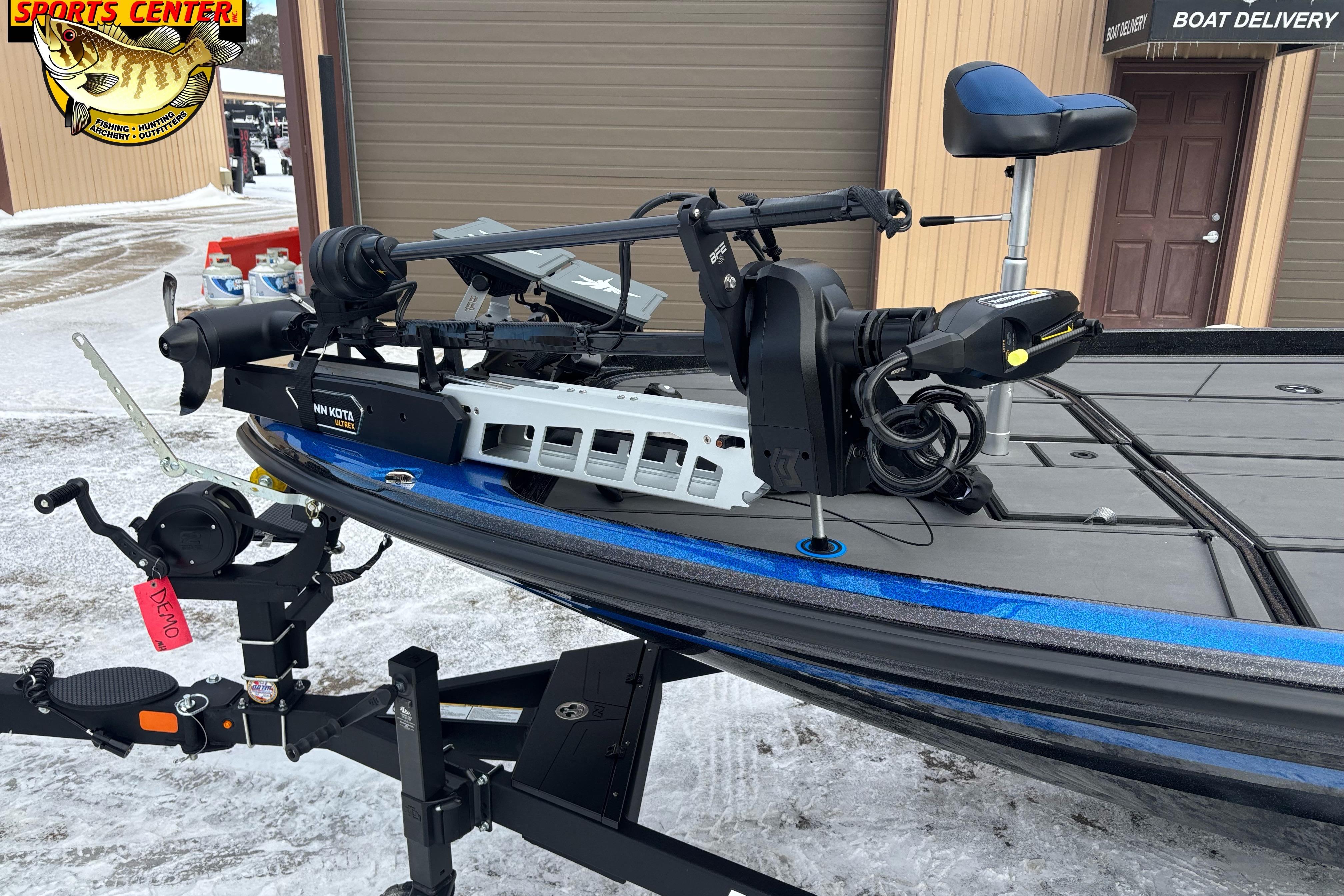 2026 Nitro Z21 XL boat with Minn Kota trolling motor in snowy setting.