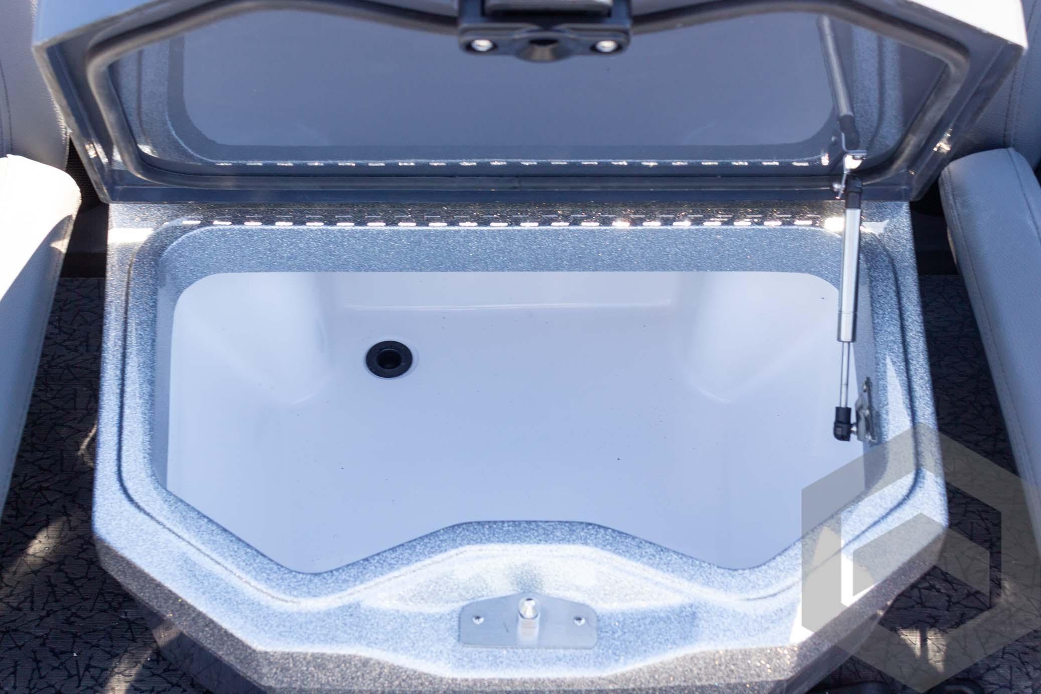 Open storage compartment in 2026 Vexus VXs21 boat, featuring a sleek design.