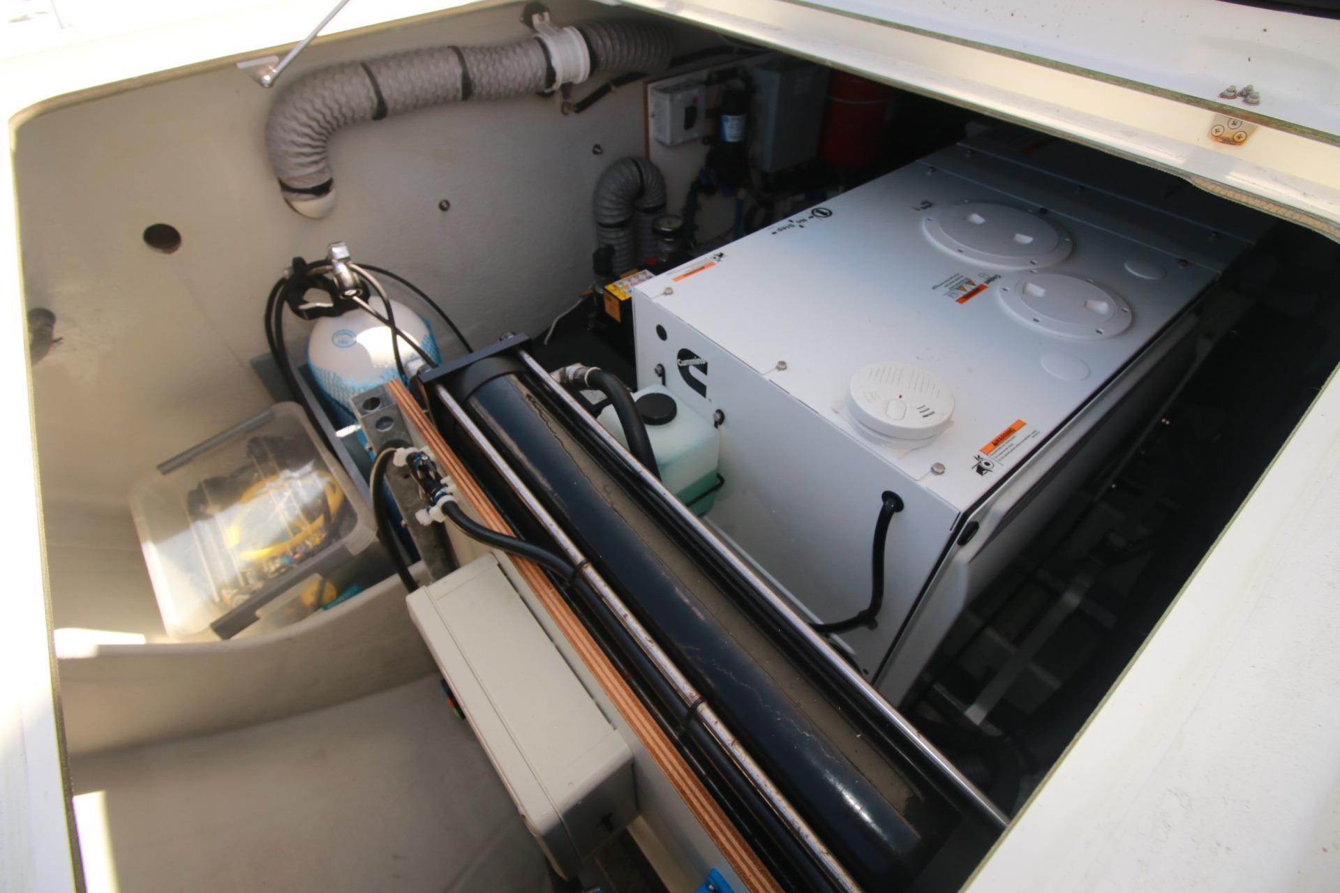 Engine compartment of 2022 Fountaine Pajot Elba 45 Catamaran, showcasing mechanical components.