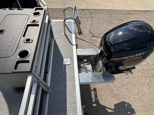 2026 Sun Tracker Fishin' Barge 20 DLX with Mercury outboard motor, top view.