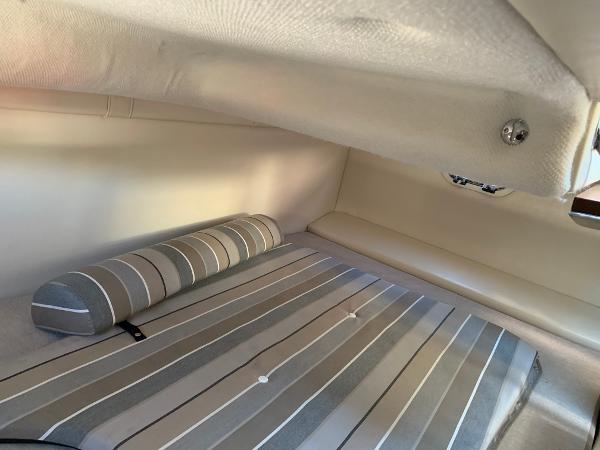 Interior of a 2017 Regal 26 Express with striped upholstery.