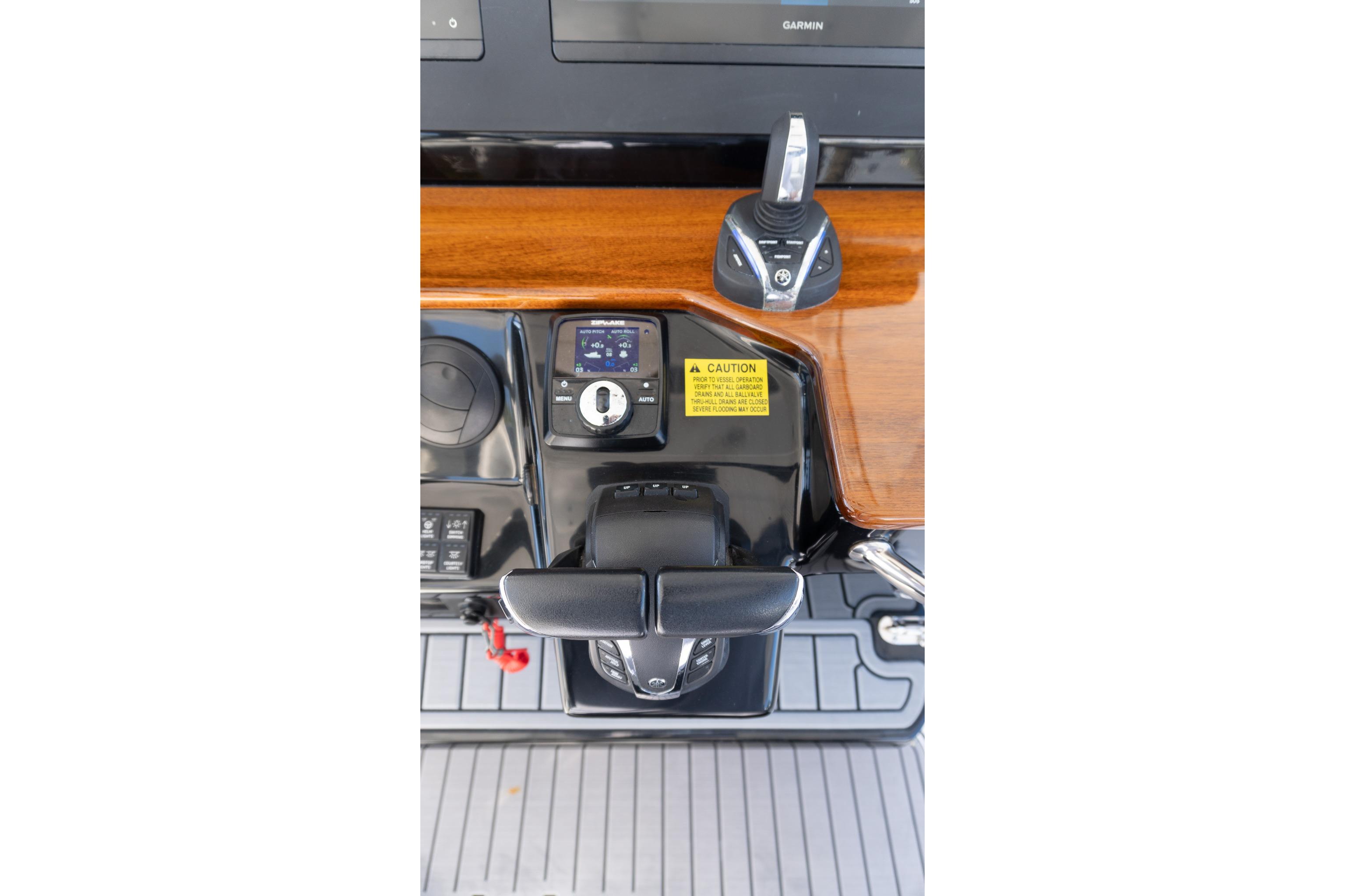 2024 Everglades 395 Center Console helm controls with modern navigation equipment.
