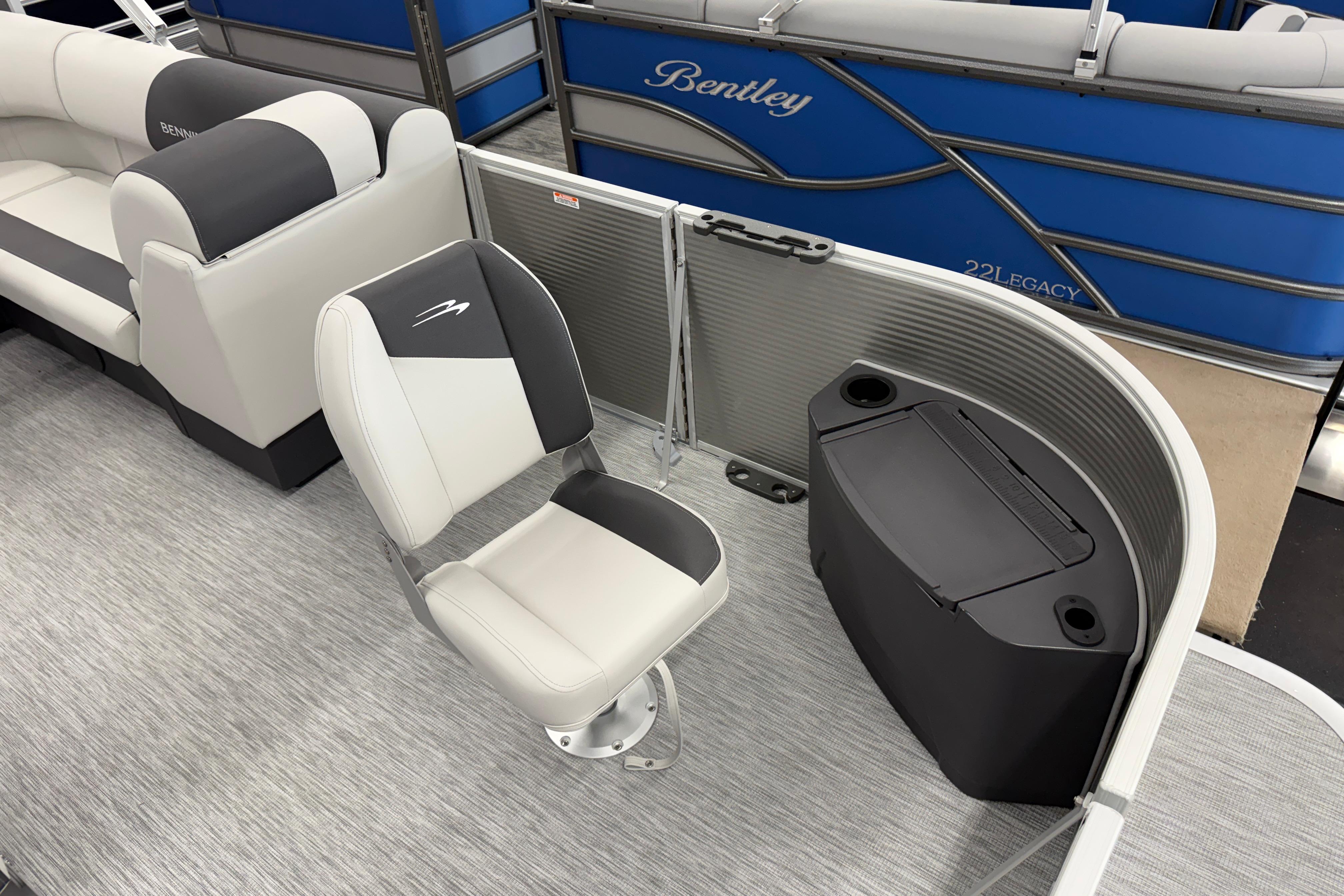 2026 Bennington 20 SF pontoon boat interior with seating and storage.