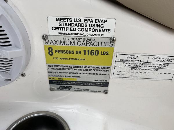 2013 Regal 1900 boat capacity label, U.S. Coast Guard maximum 8 persons or 1160 lbs.
