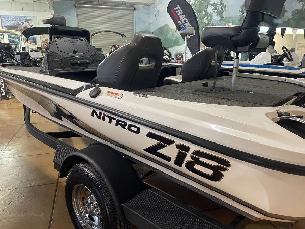 2025 Nitro Z18 Pro fishing boat displayed indoors on a trailer.