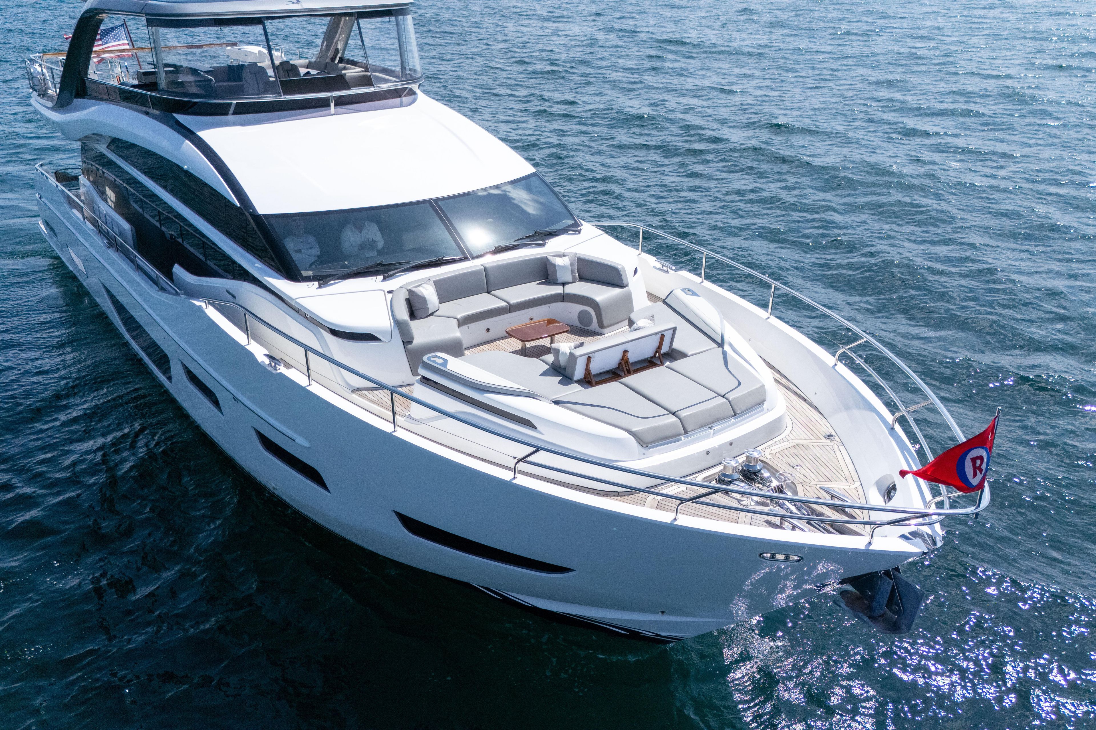 Luxurious 2020 Princess Y85 yacht cruising on open water.