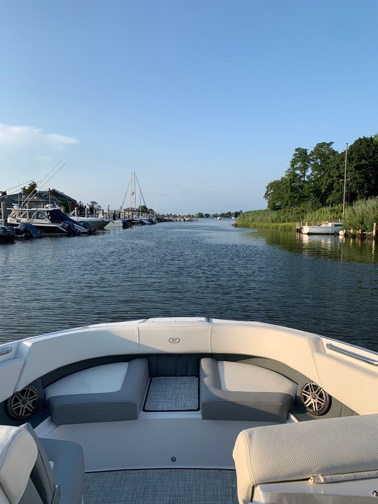 Cobalt SC23 boat on calm river, 2020 model.