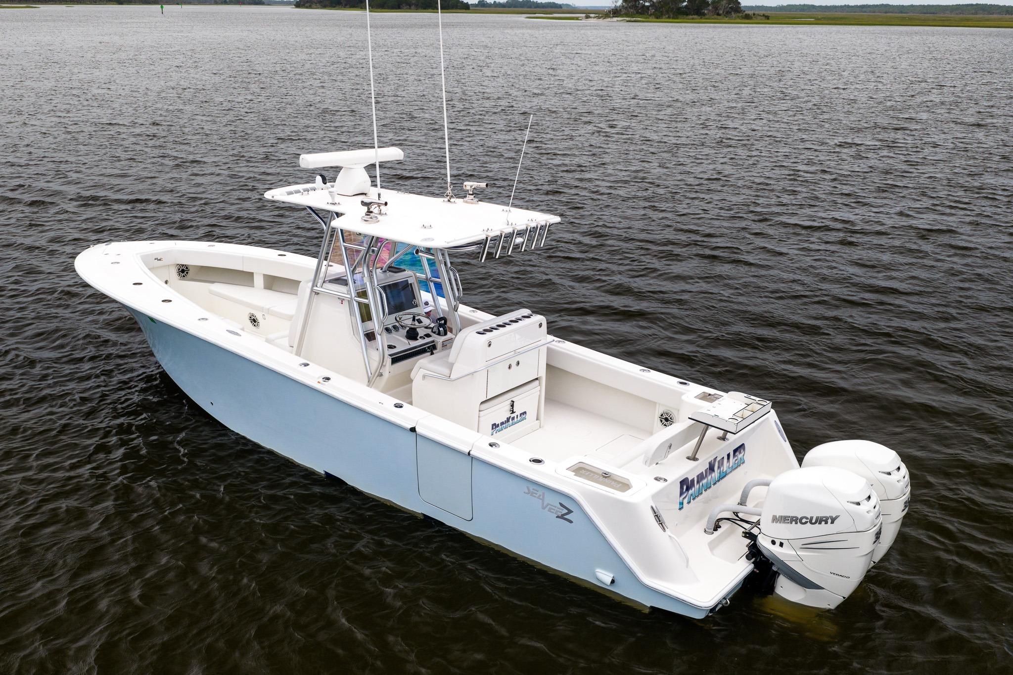 2019 SeaVee 322Z boat with dual Mercury engines on calm water.
