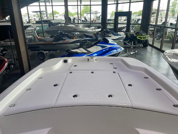 2024 Mako Pro Skiff 19 CC boat on display in showroom.