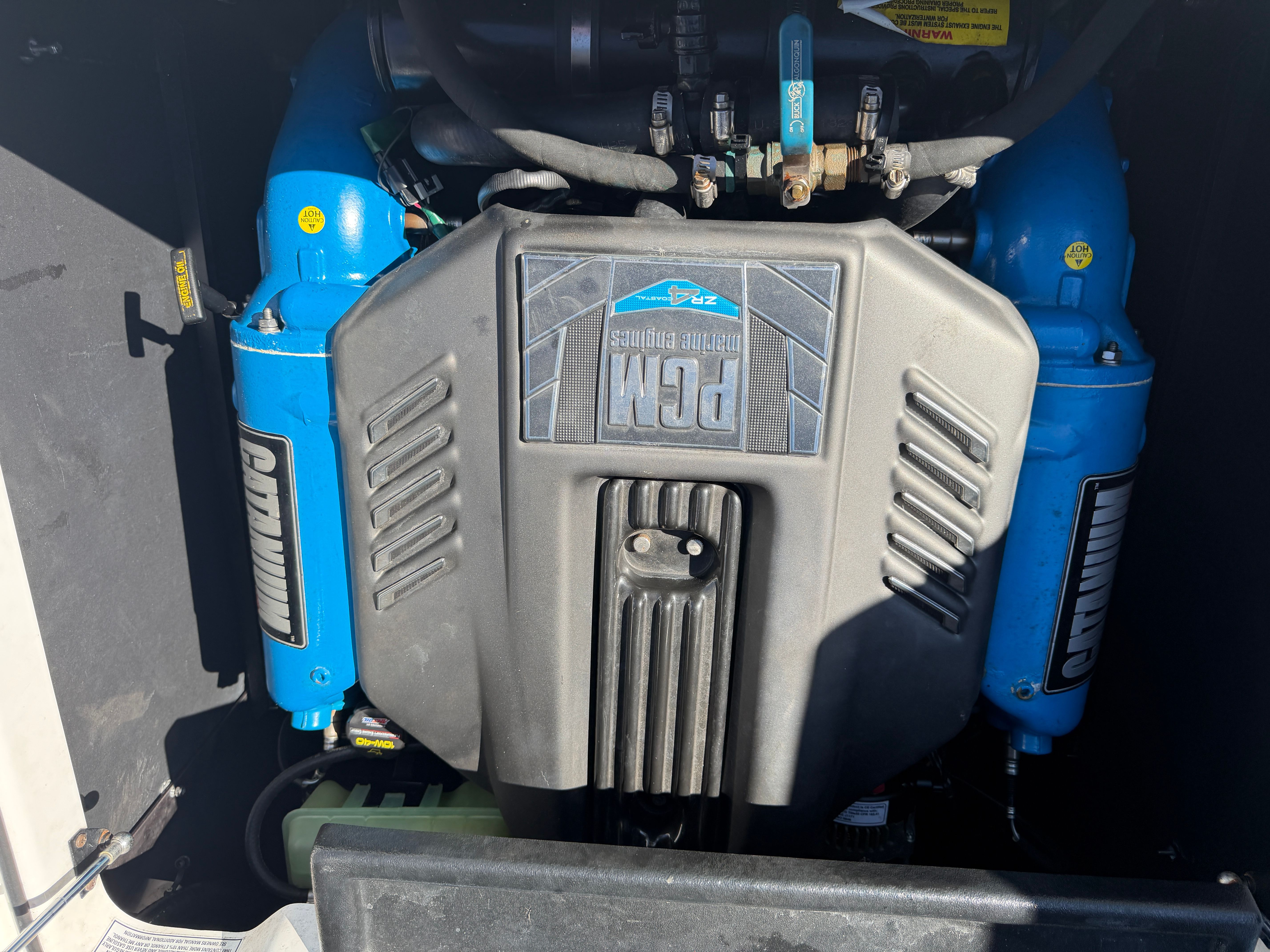 Engine compartment of a 2018 Nautique Super Air Nautique GS22 with a PCM engine.