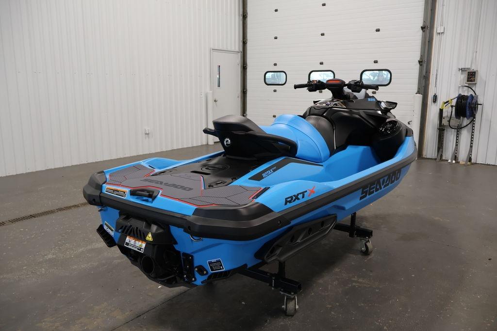 2026 Sea-Doo RXT-X 325 jet ski in a garage setting.