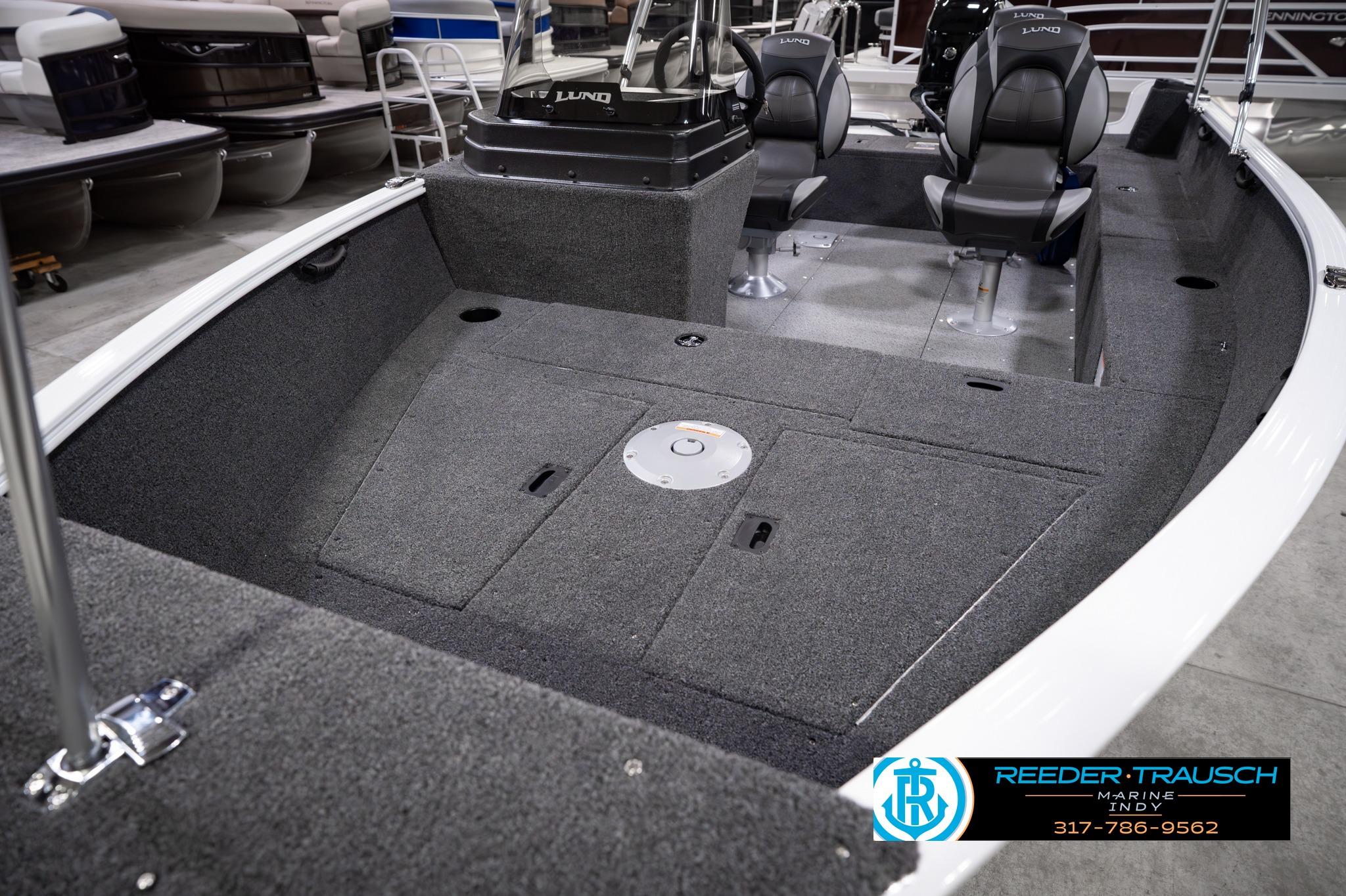 2026 Lund 1650 Rebel XL SS boat interior with seating and storage compartments.