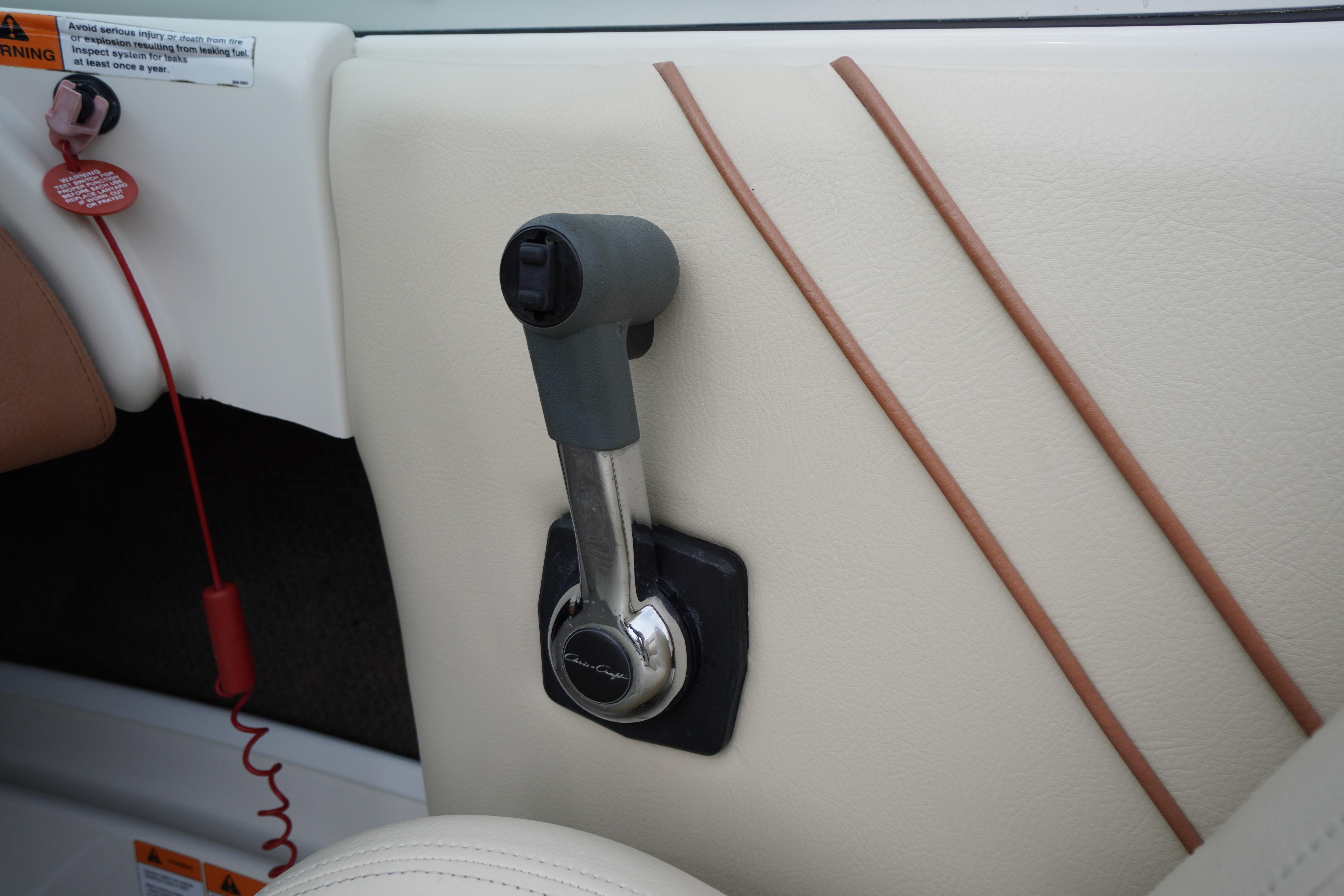 2005 Chris Craft Speedster Heritage throttle control on beige interior panel.