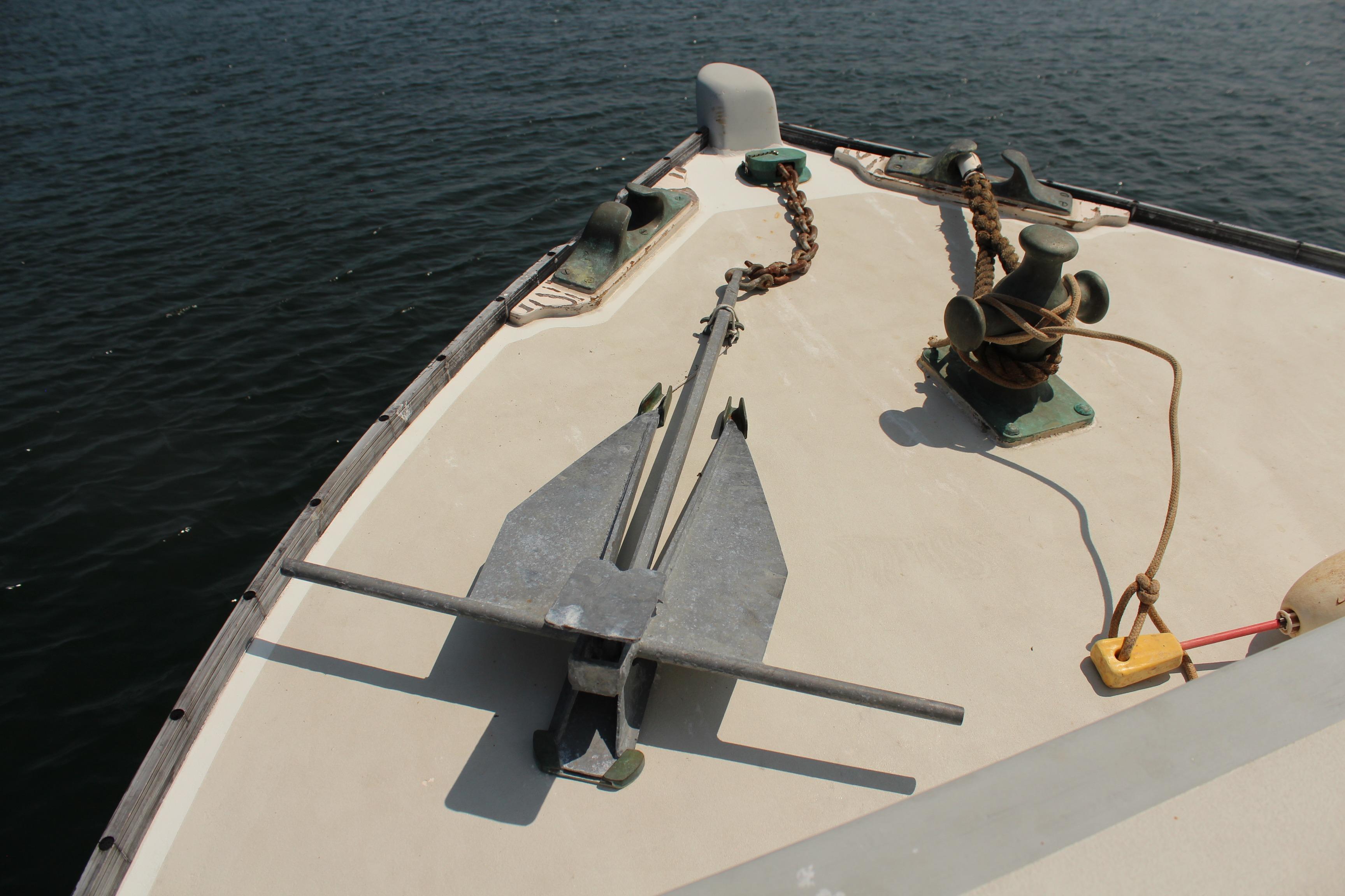 Bow of 1992 Novi 32 Downeast boat with anchor and mooring equipment.