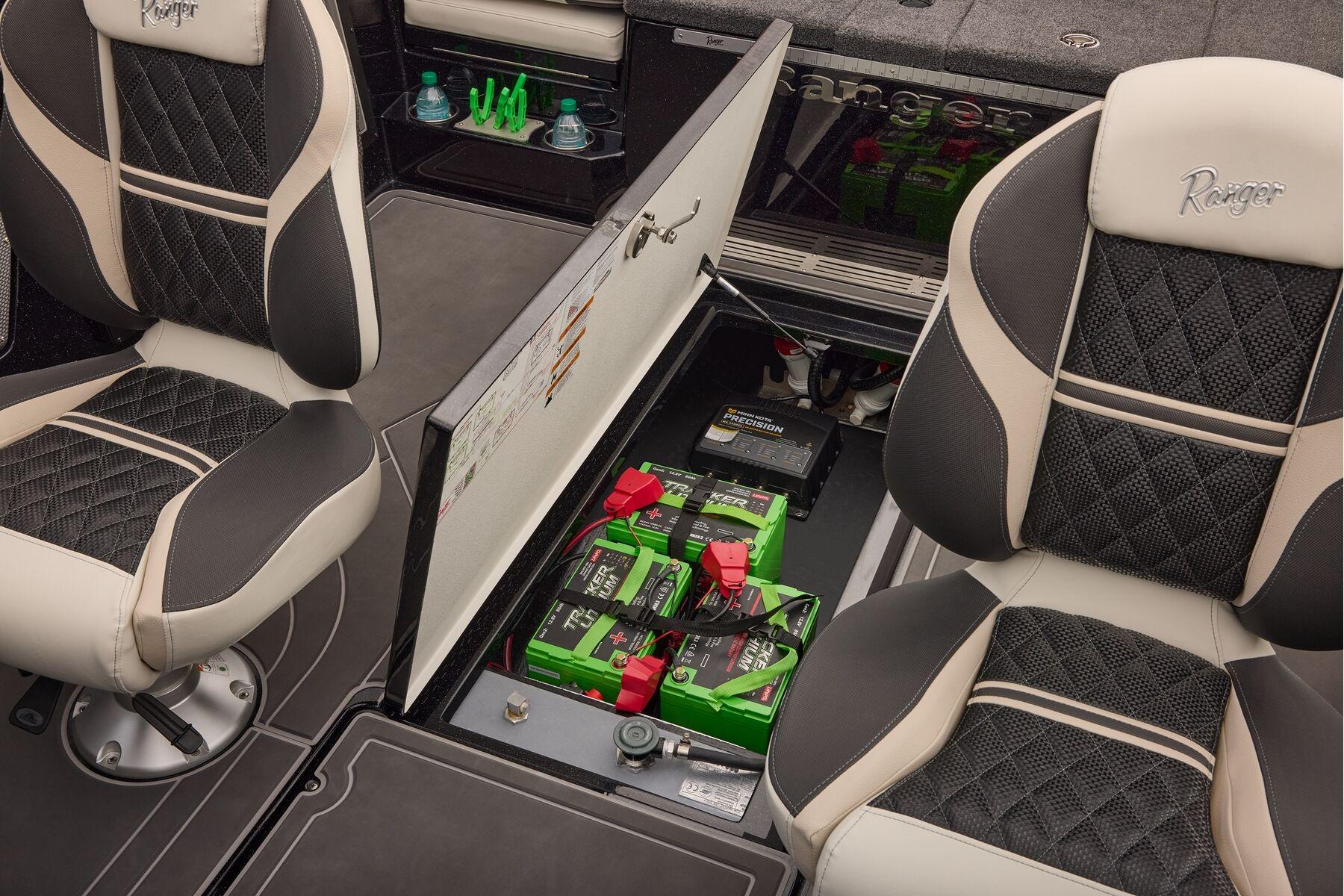 Manufacturer Provided Image: 2026 Ranger 620xFS Pro boat interior with battery compartment and stylish seating.