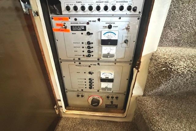 Electrical control panel on a 1989 Carver 32 Aft Cabin Motor Yacht.