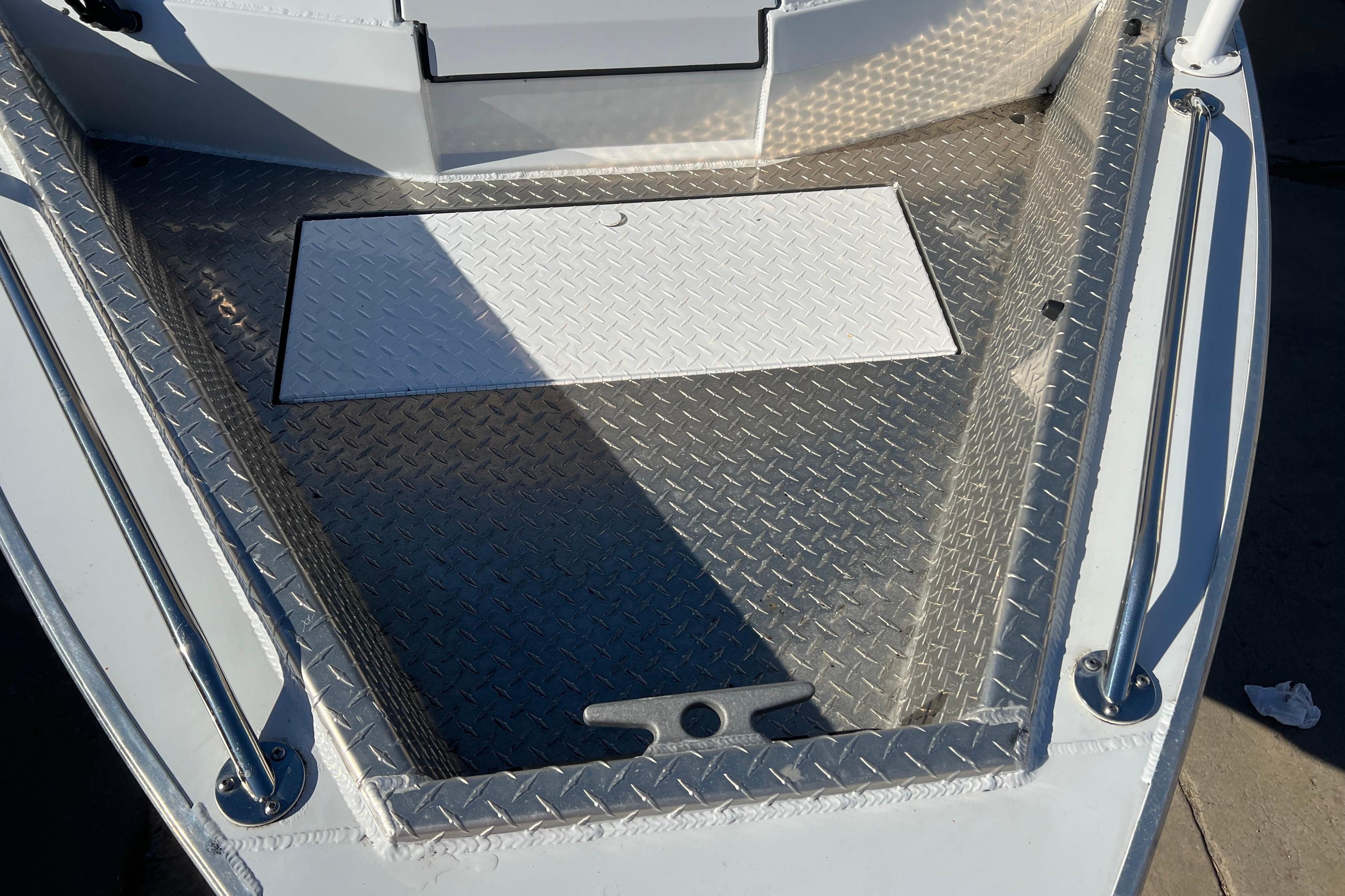 Bow area of 2019 KingFisher 1825 Falcon boat with diamond plate flooring.