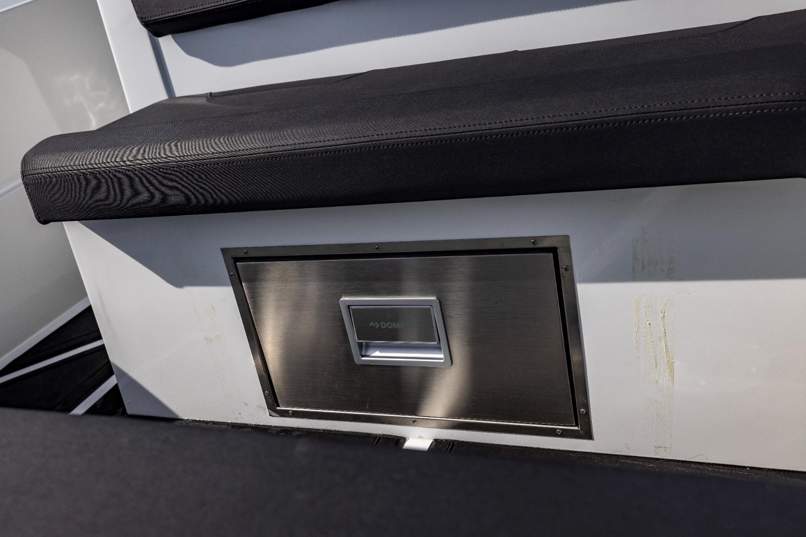 Stainless steel storage compartment on Iron 707 boat, 2022 model.