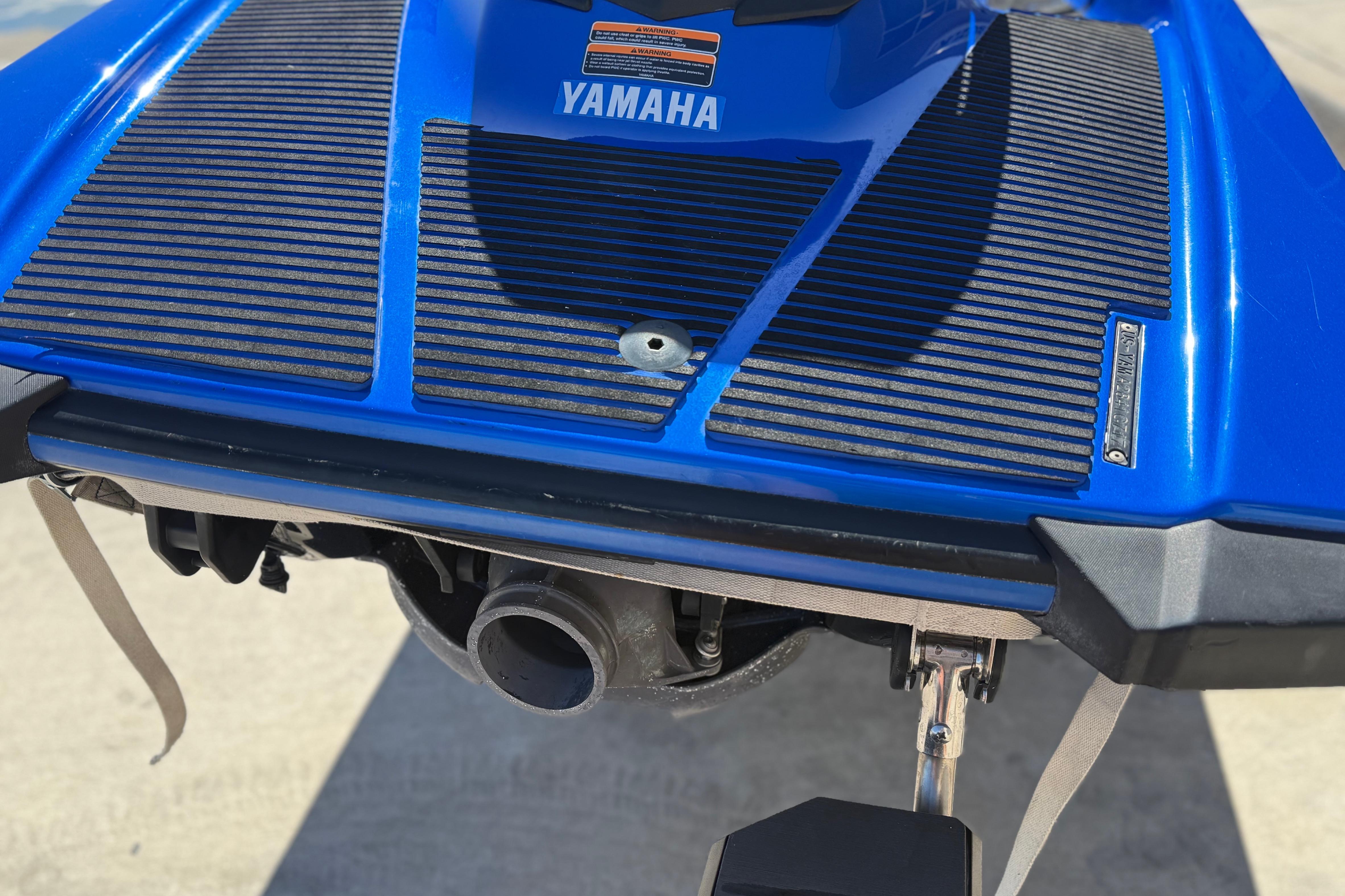 2017 Yamaha WaveRunner EX Deluxe rear view, showcasing blue deck and exhaust.