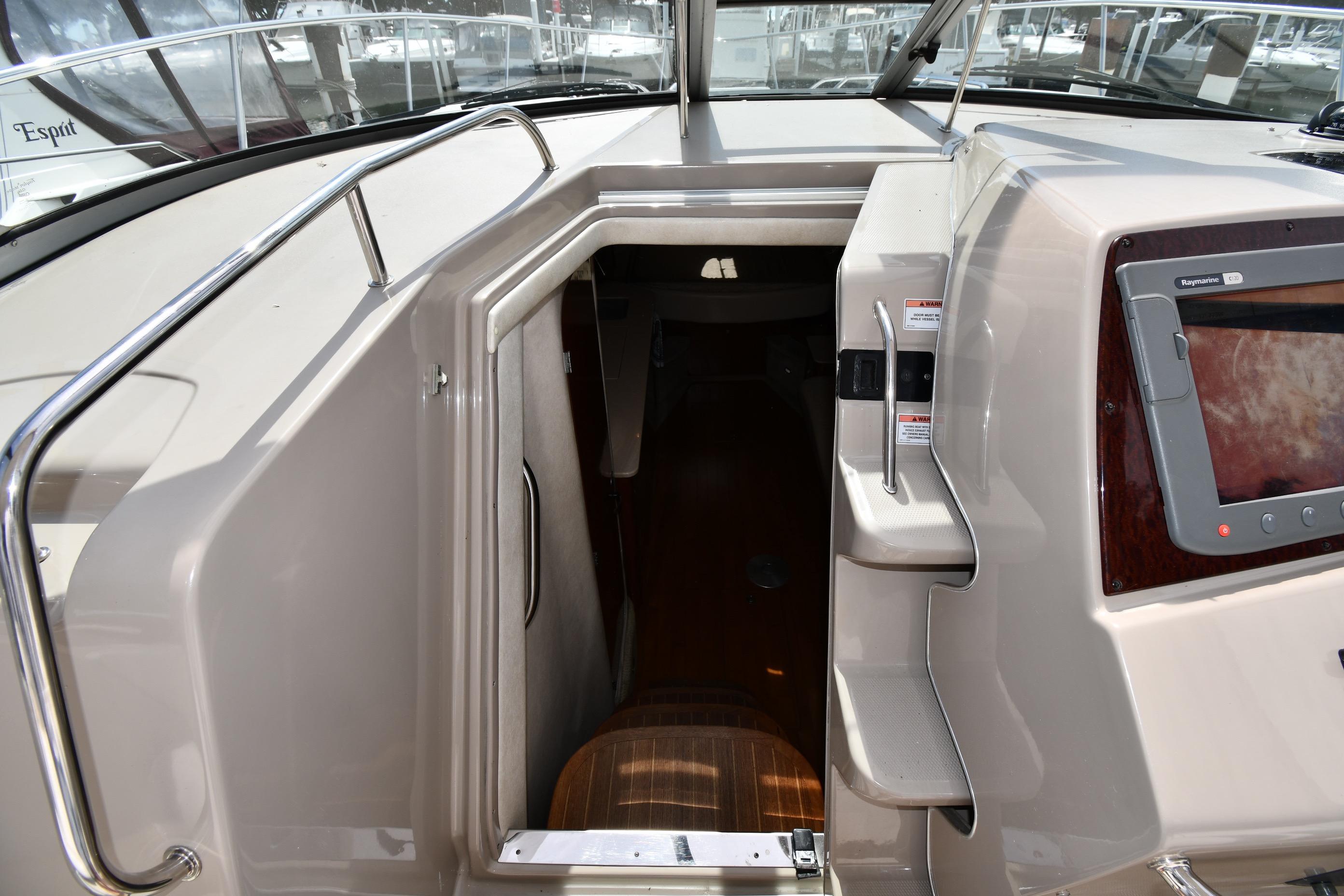 2008 Sea Ray Sundancer 350 cabin entrance with control panel and steps.