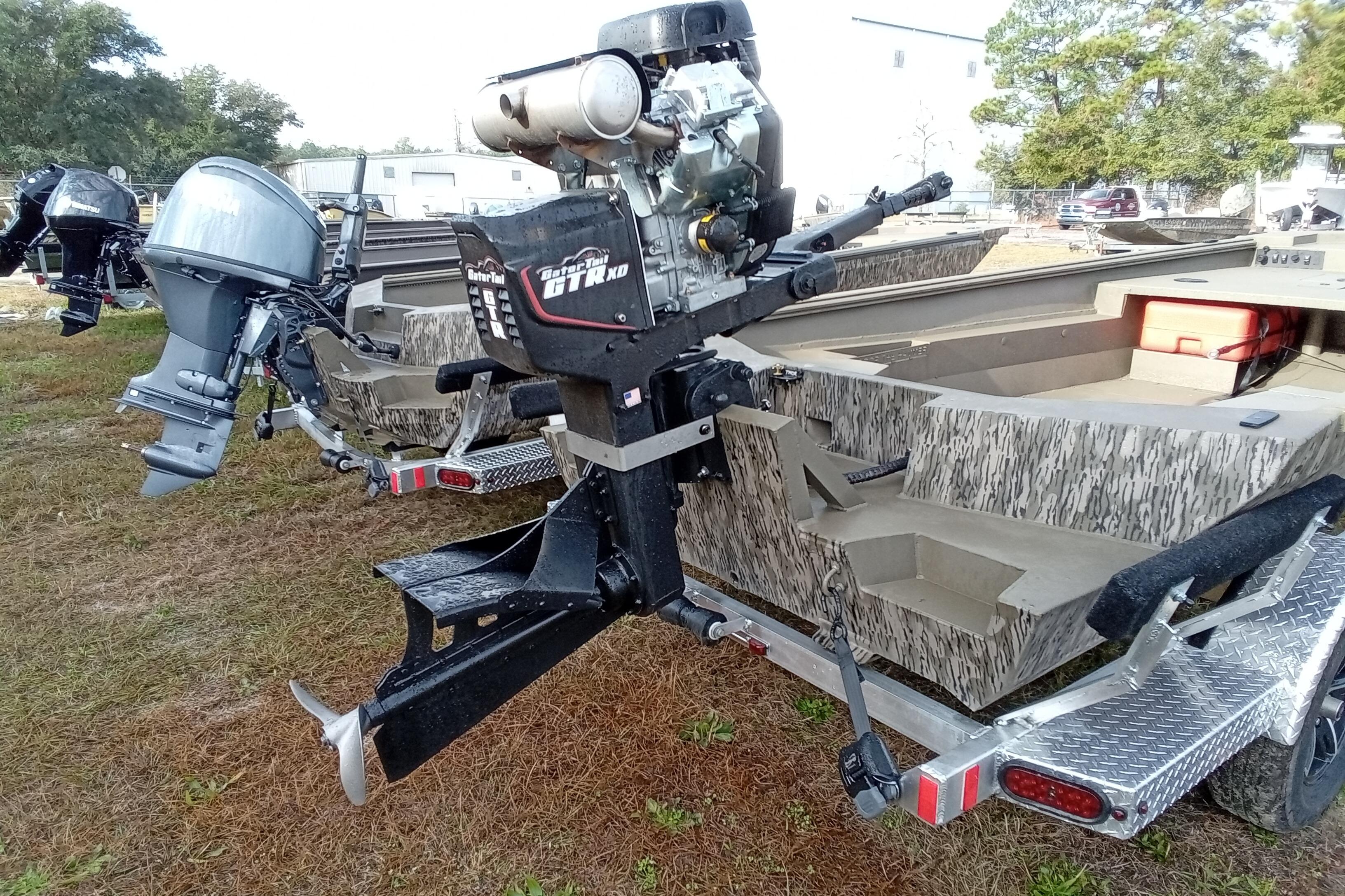 2026 Thor 1754 Swamp Hammer boat with powerful outboard motor on display.