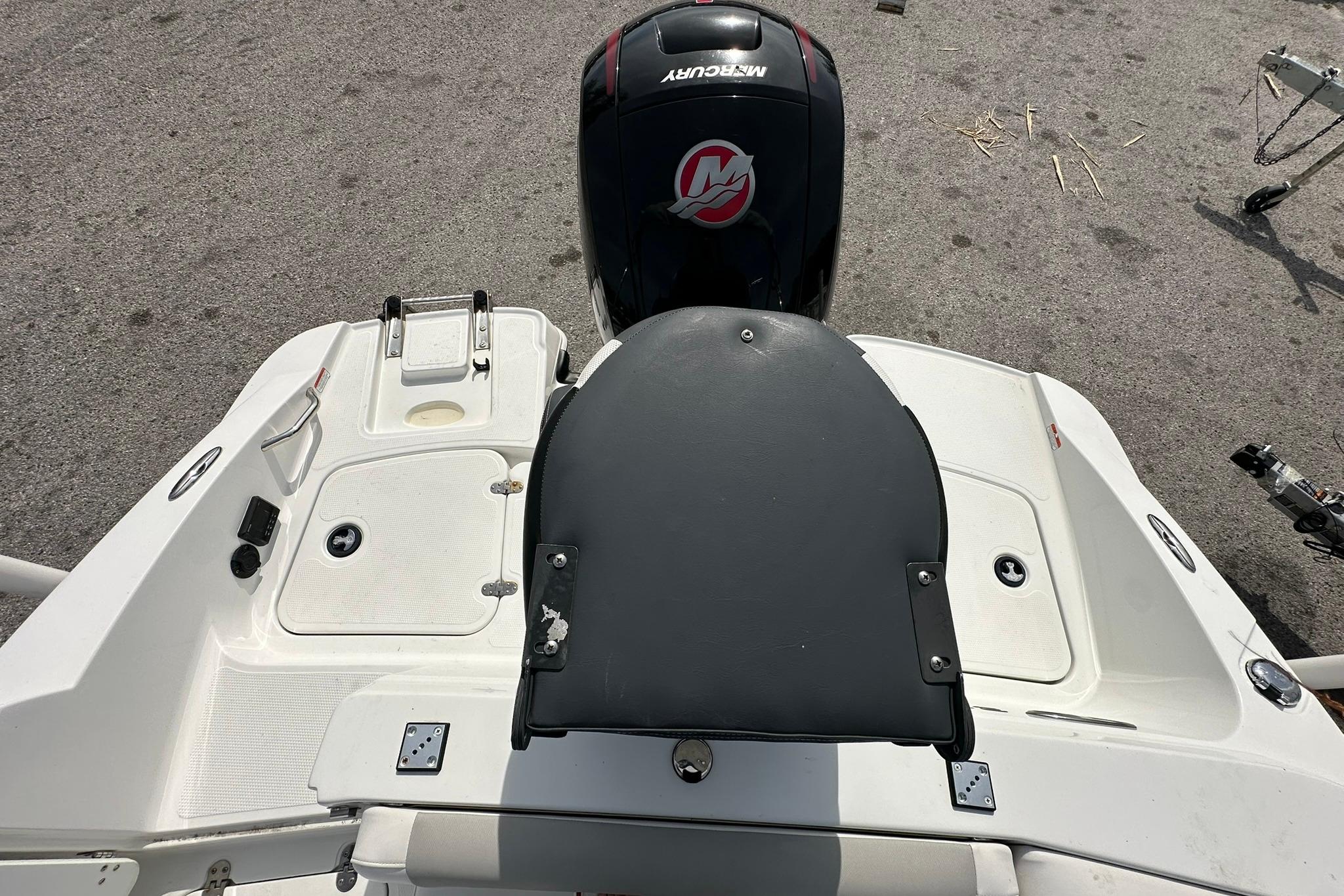2021 Tahoe 2150 boat with Mercury engine, featuring a spacious deck and swim platform.