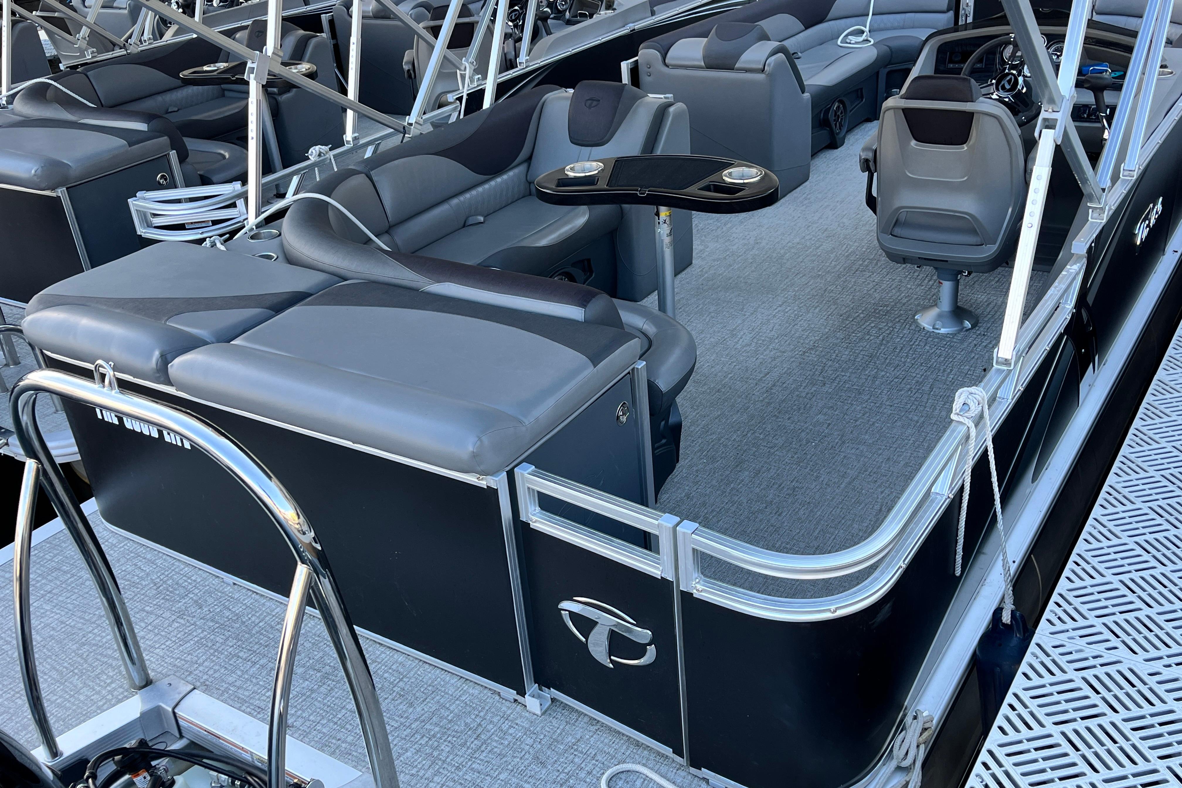2023 Tahoe Pontoon LTZ Cruise boat interior with luxurious seating and modern design.