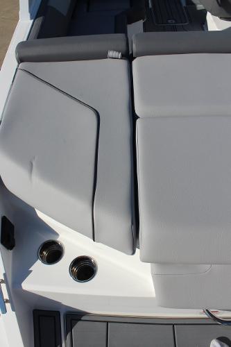 2025 Cobalt CS23 boat interior with gray seating and cup holders.