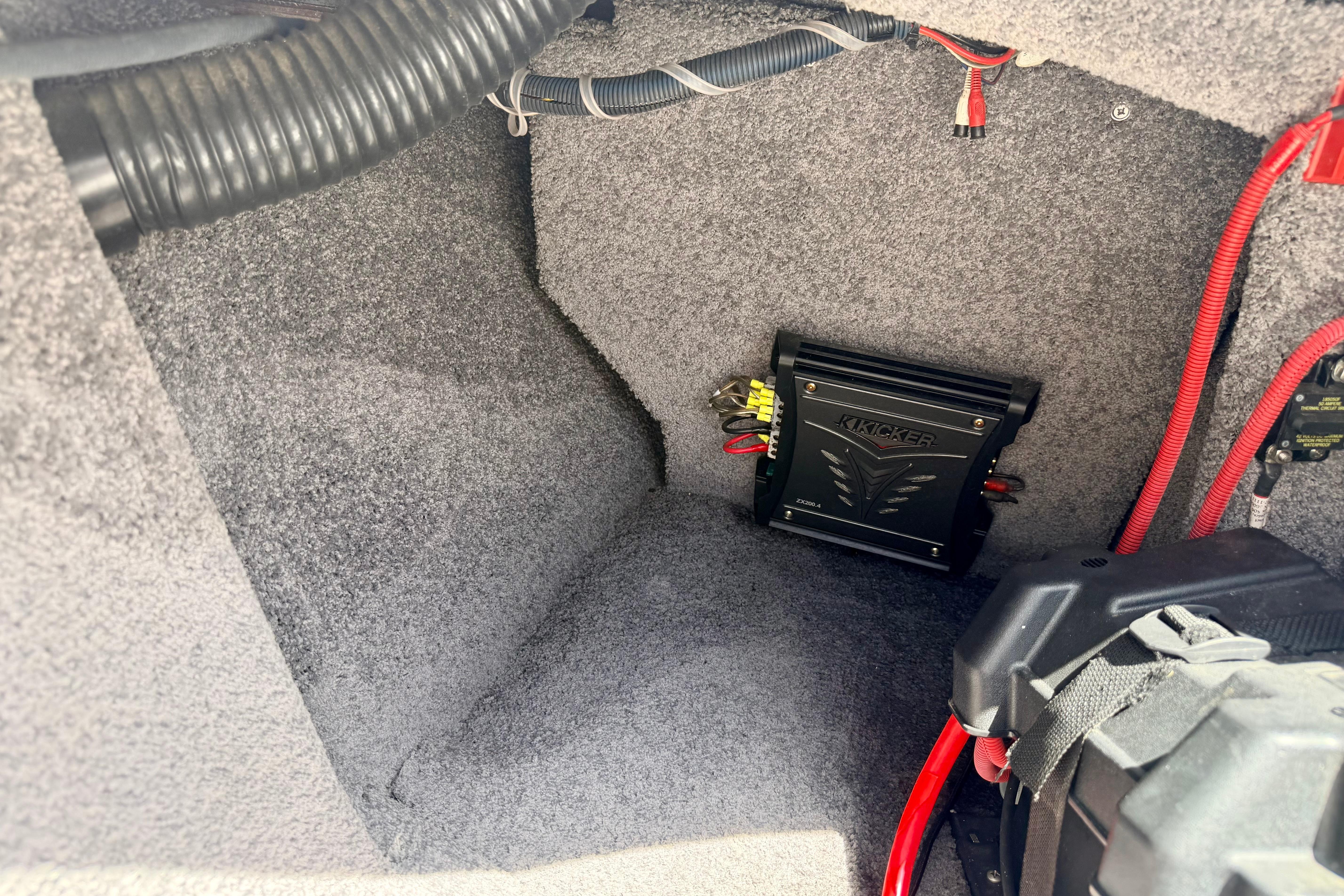 2008 Moomba Outback V interior showing audio amplifier installation with wiring.