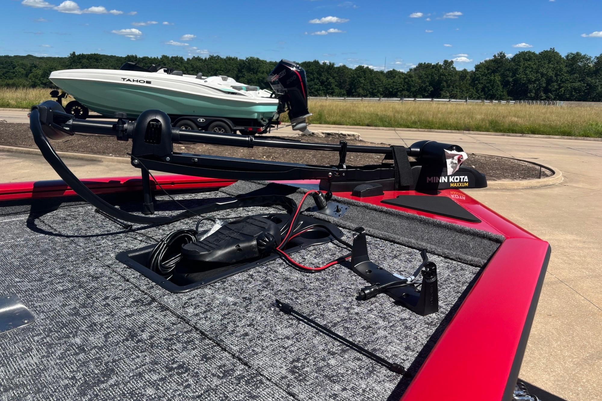 2026 Tracker Pro Team 195 boat with Minn Kota trolling motor on deck.