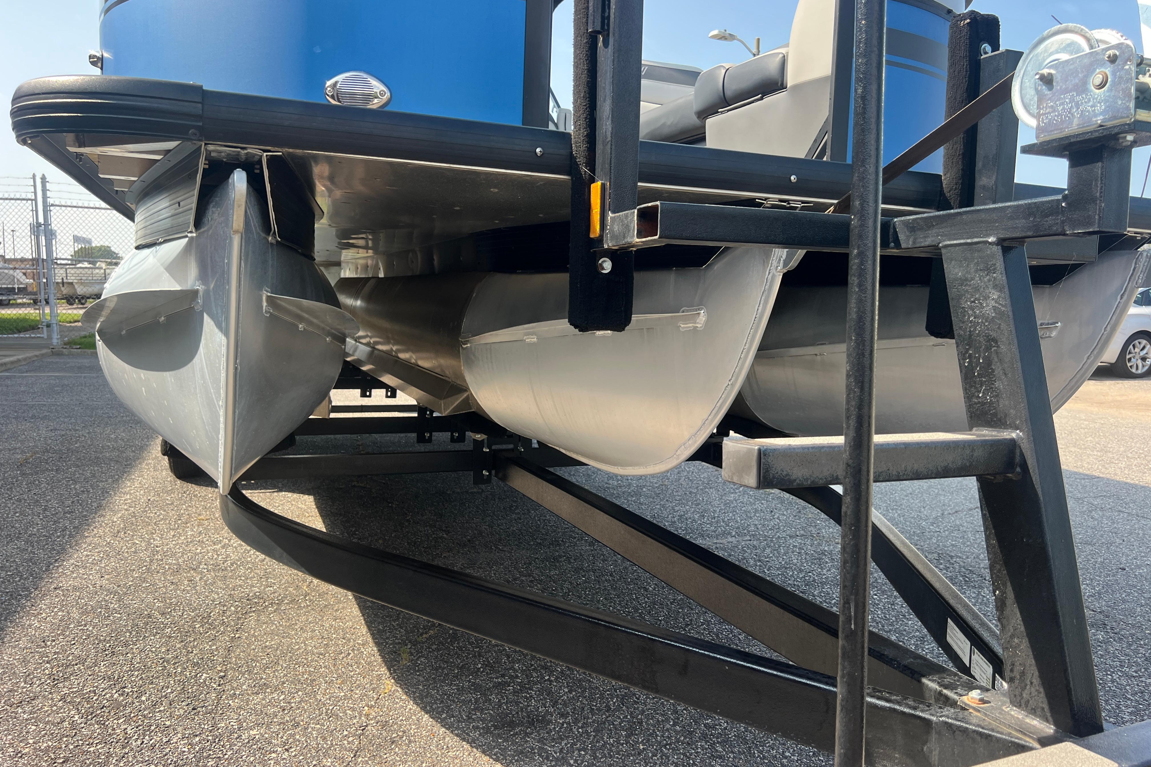 2022 Viaggio Lago V-U 22 pontoon boat on trailer, close-up view of pontoons.