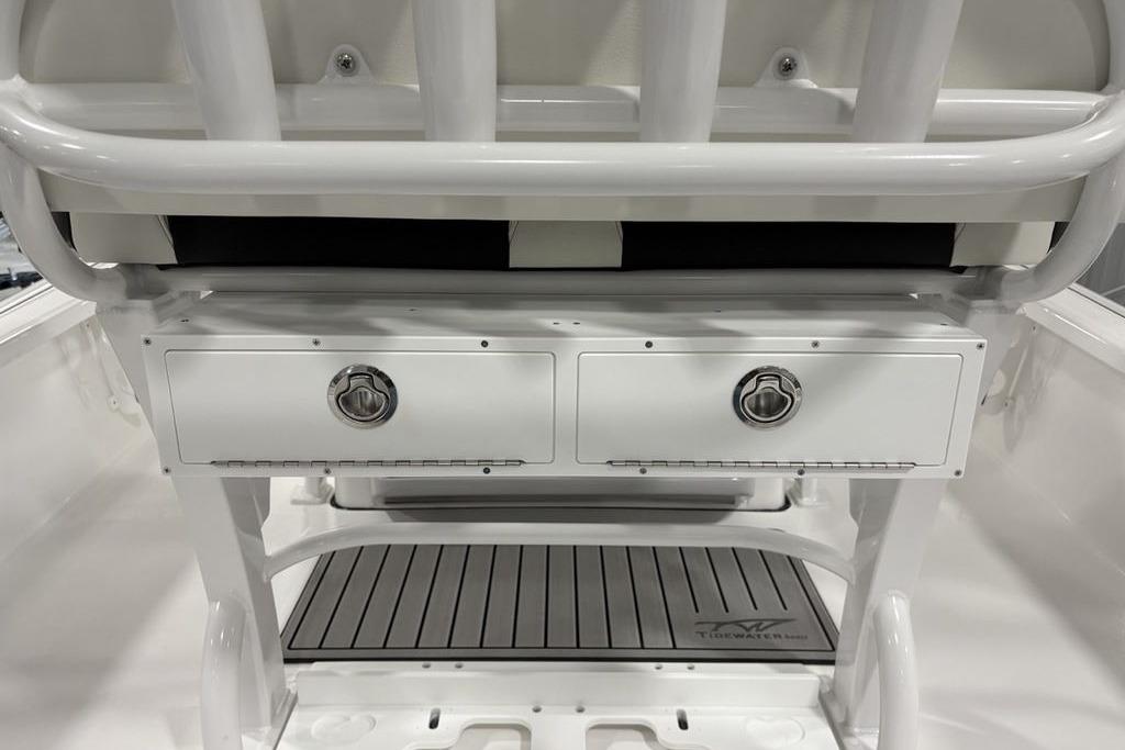 2026 Tidewater 2210 Carolina Bay boat interior with storage compartments and seating.