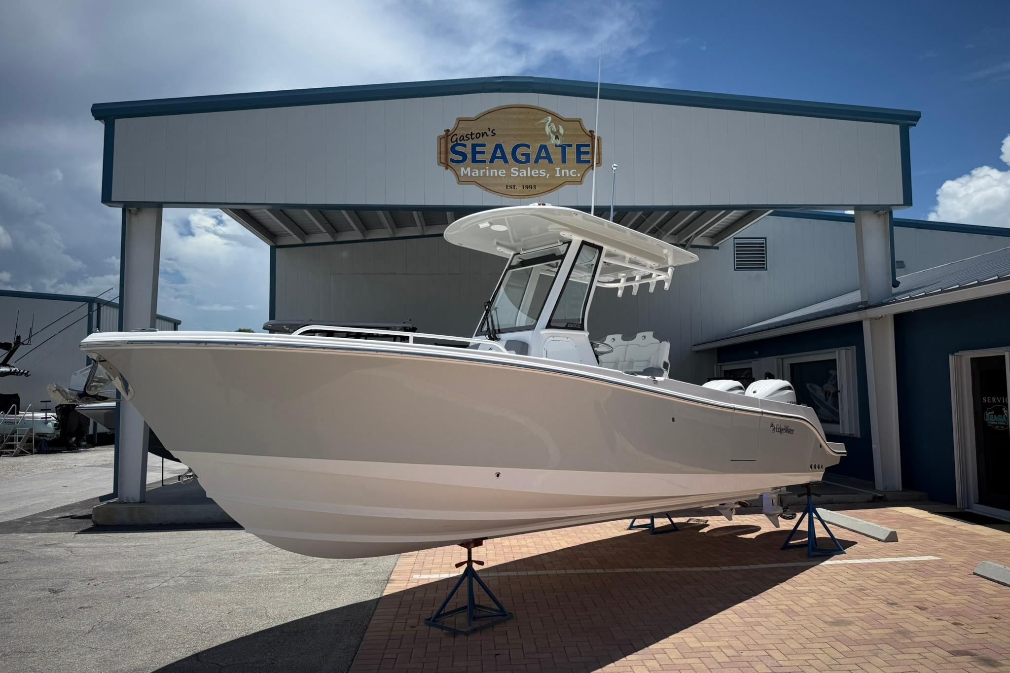 2026 Edgewater 250CC boat displayed at Seagate Marine Sales dealership.