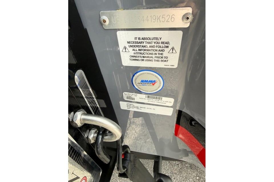 2026 Nitro Z21 XL boat warning label and certification sticker close-up.